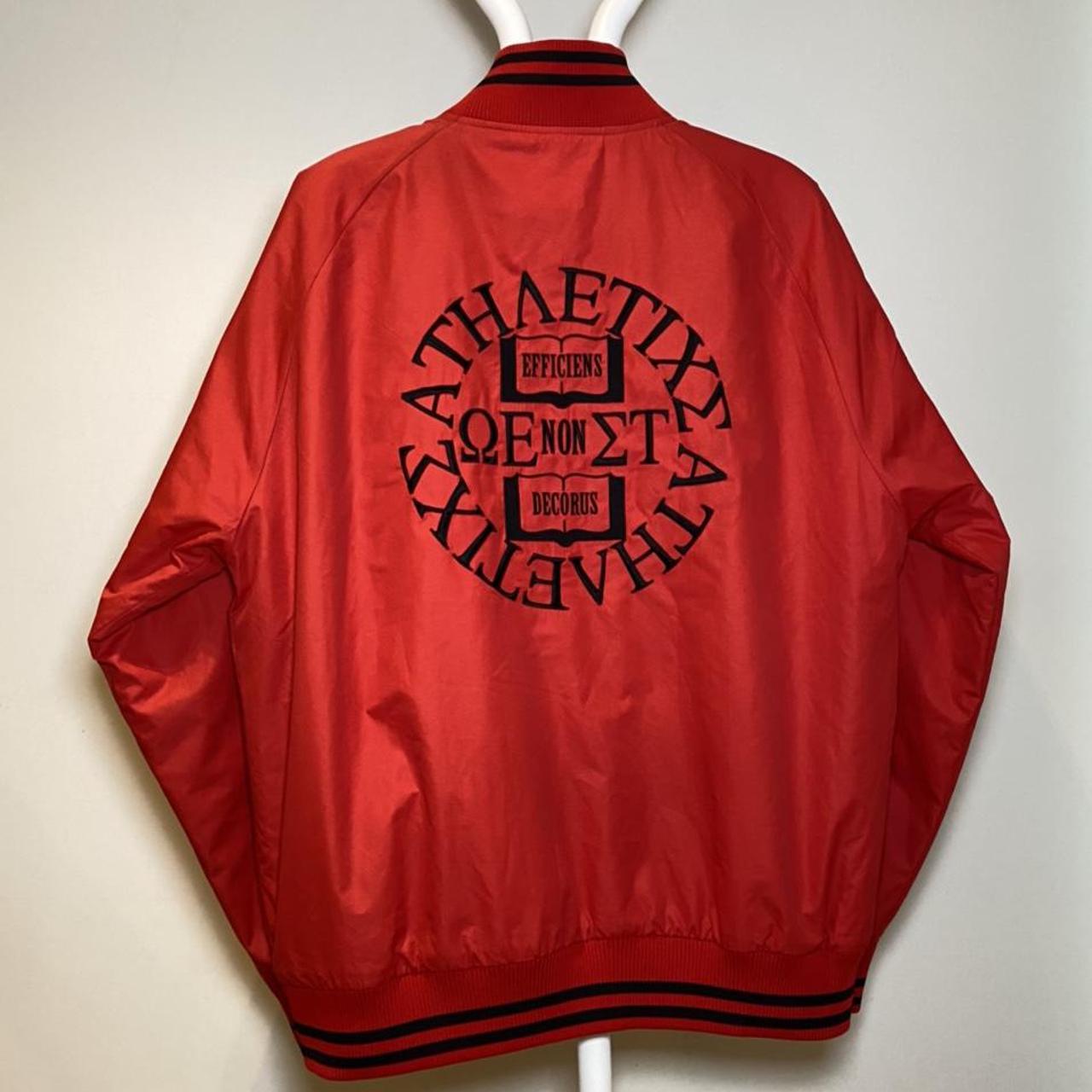 red and black nike coat