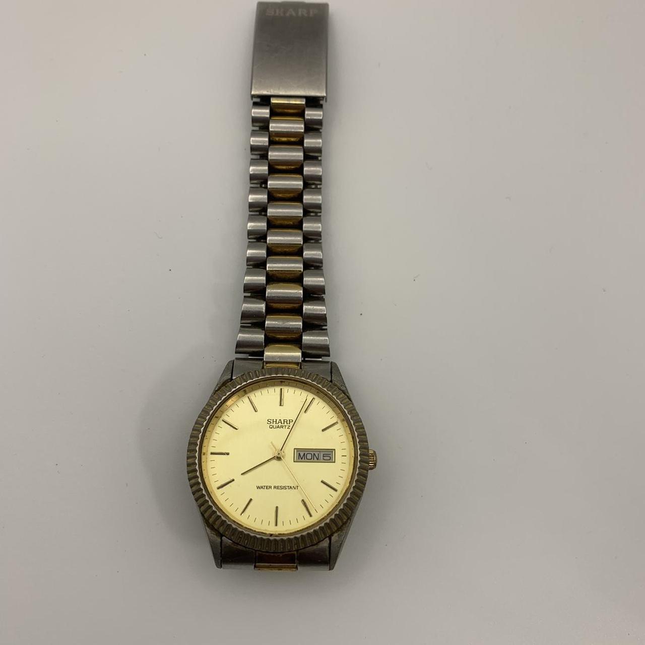 Sharp quartz best sale watch vintage