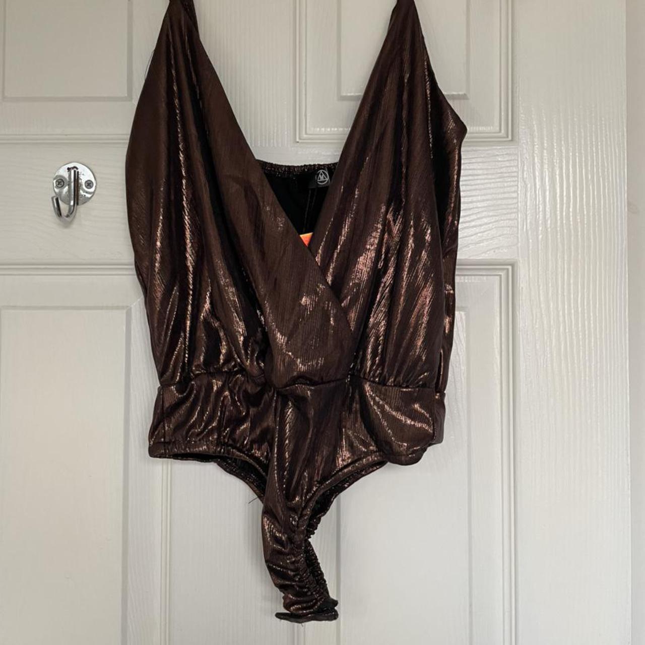 Missguided bronze bodysuit. Wrap front, metallic... Depop