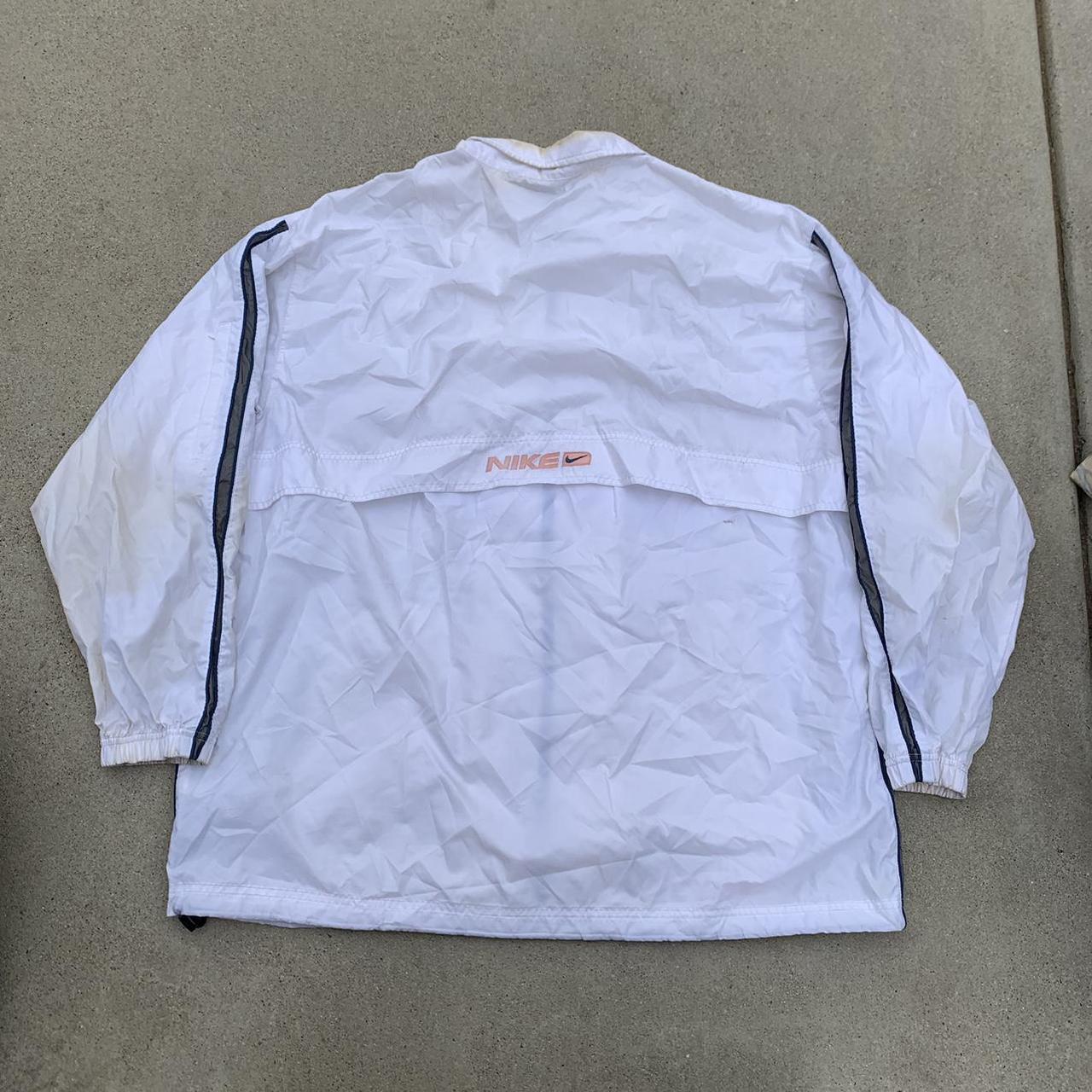 Peach and blue nike windbreaker best sale