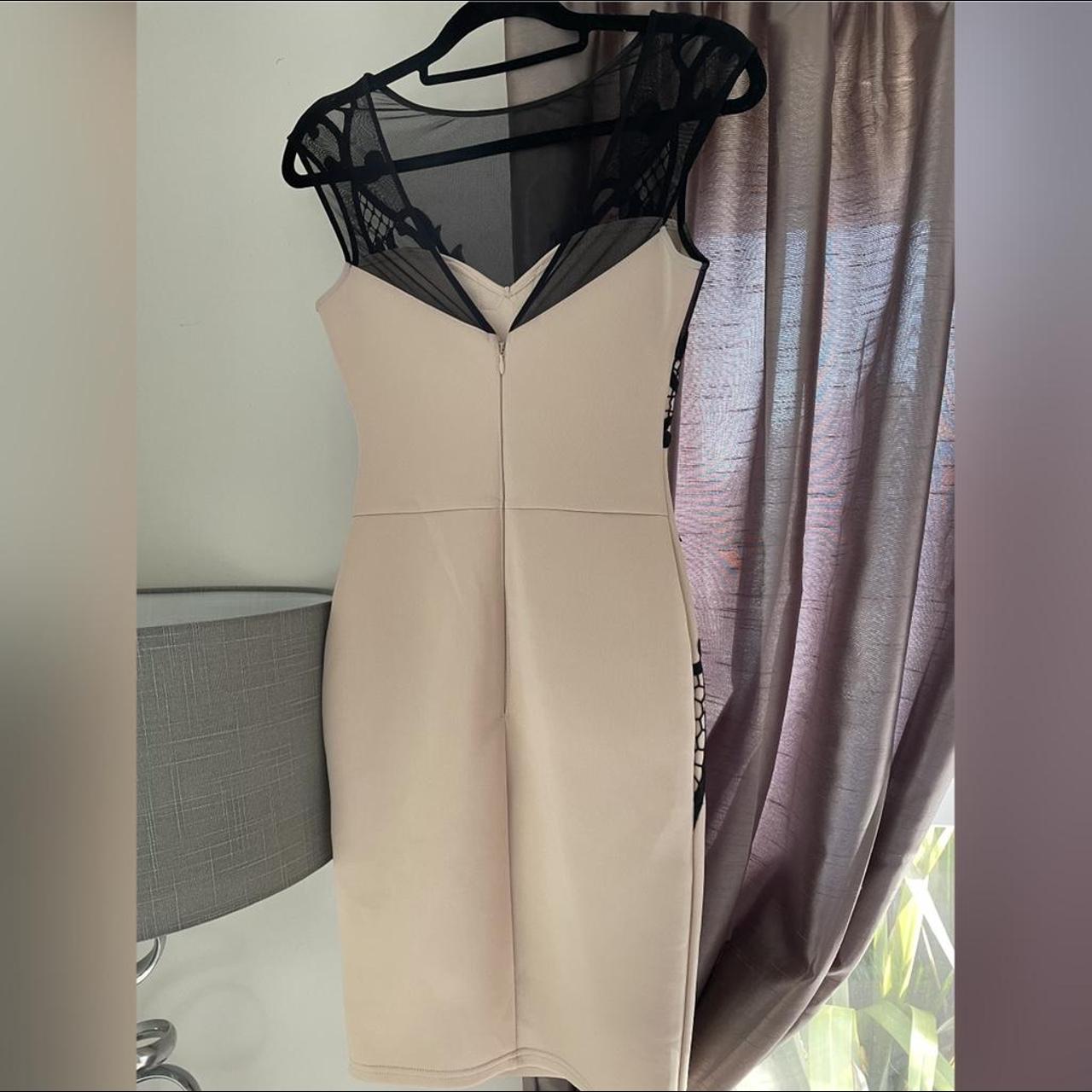 A cream Lipsy dress with black mesh and lace detail. Depop