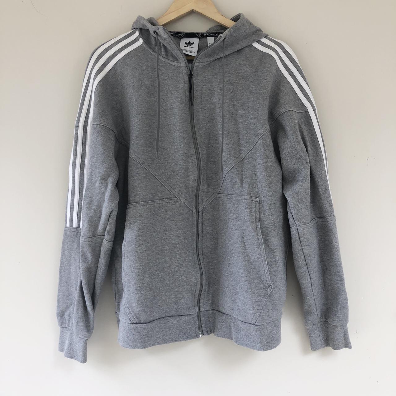 Very cool grey Adidas zip up hoodie On the back it... Depop