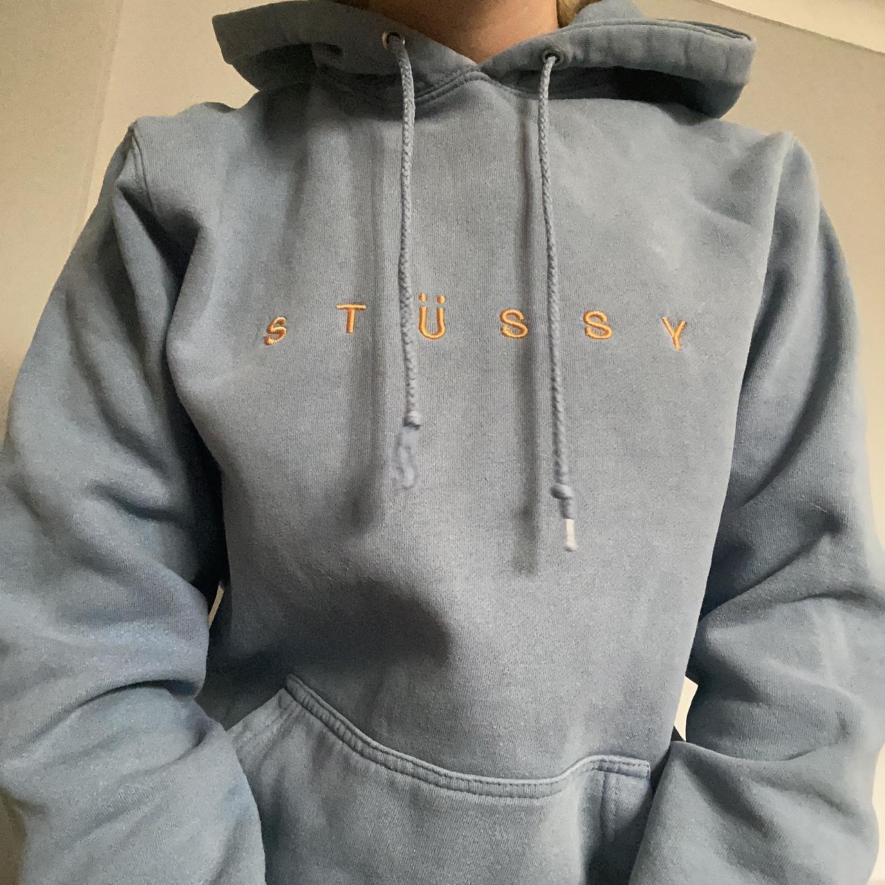Stussy light blue hoodie w/ gold embroidered... Depop