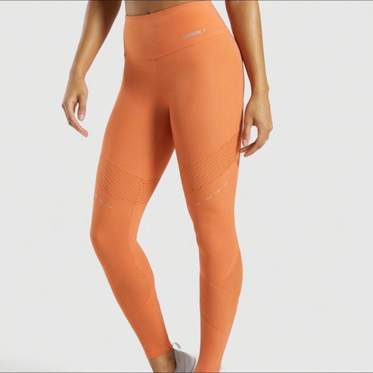 Gymshark orange leggings - size small Slight piling - Depop