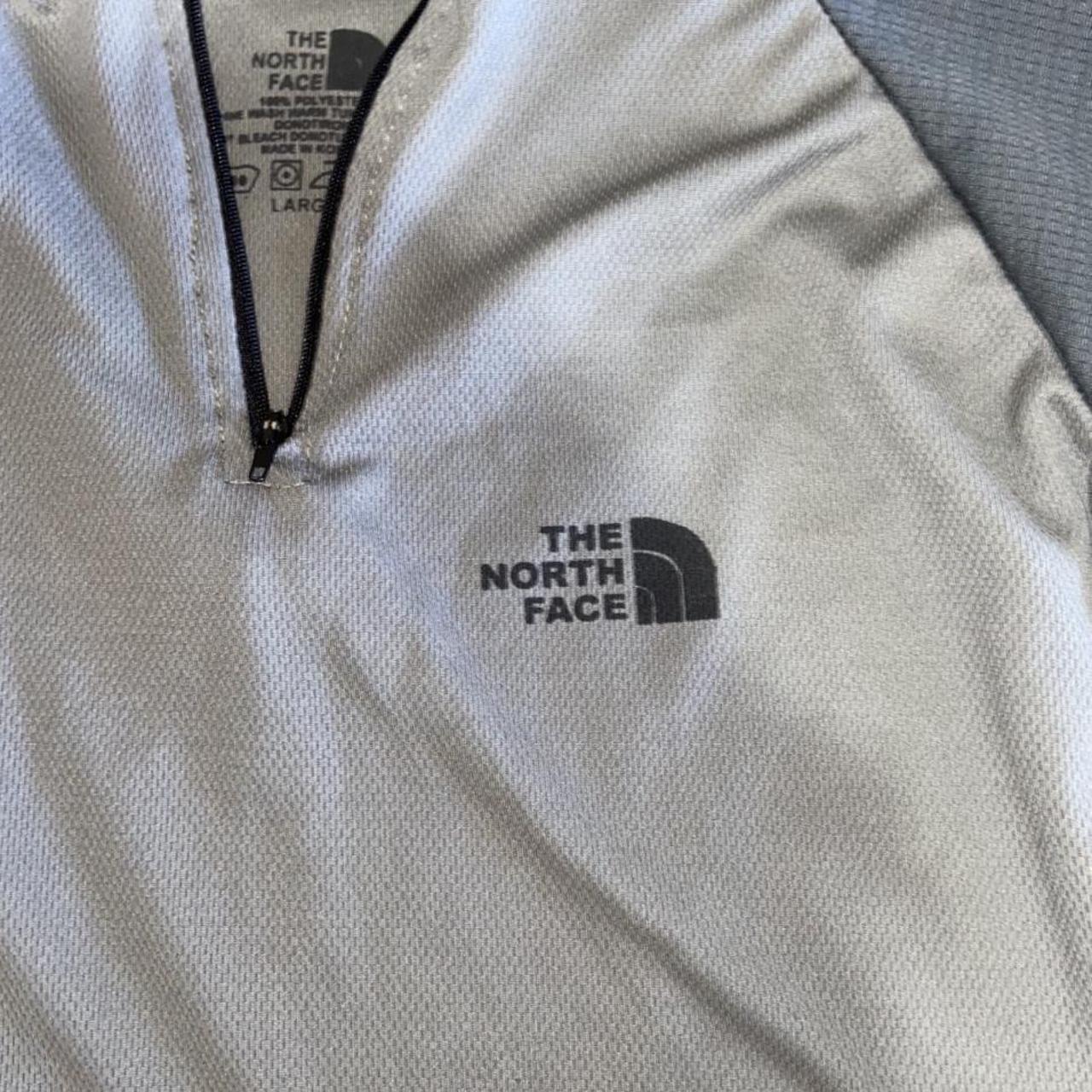 The north face two tone grey quarter zip 100%... - Depop