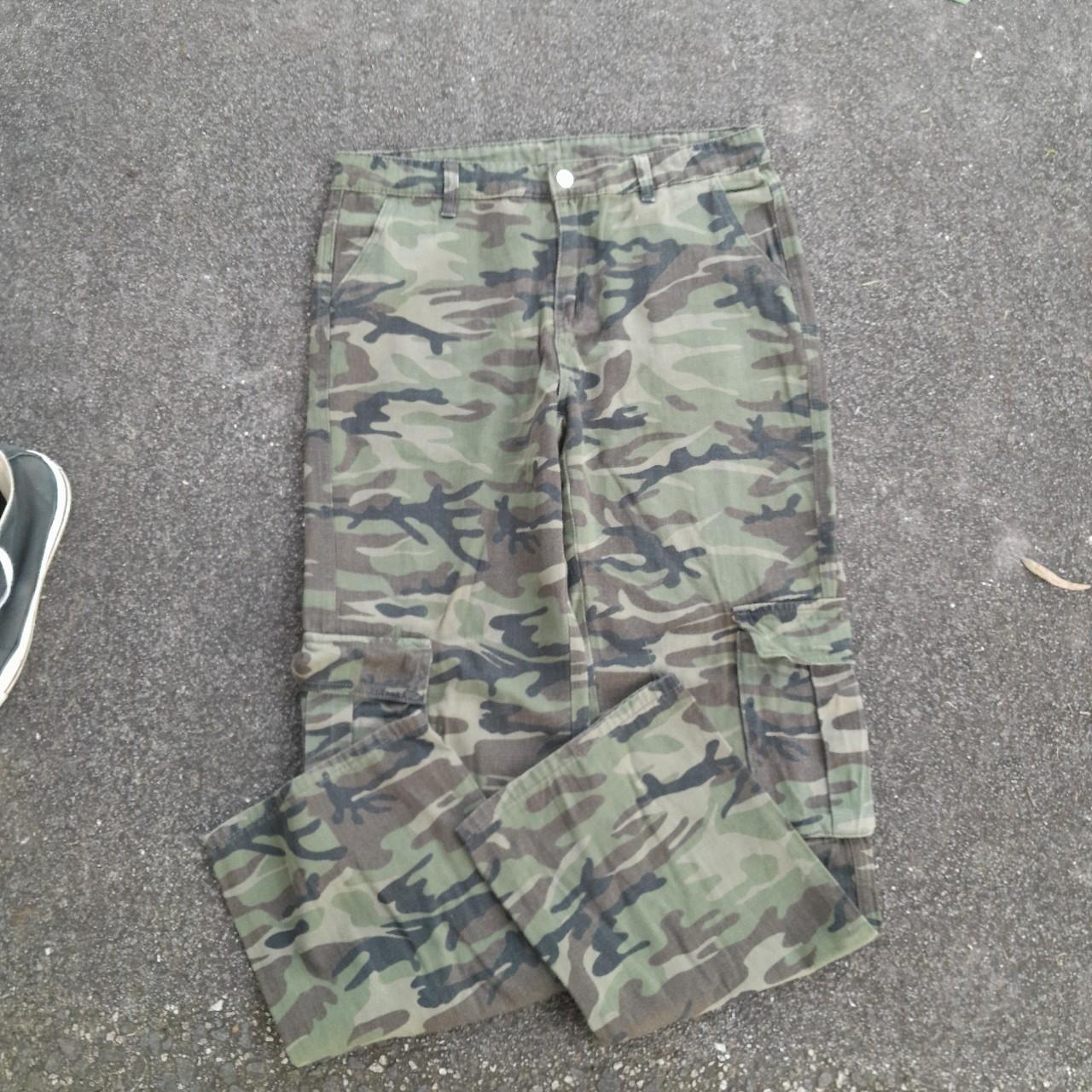 Camo cargo pants with slightly baggy fit through leg... - Depop