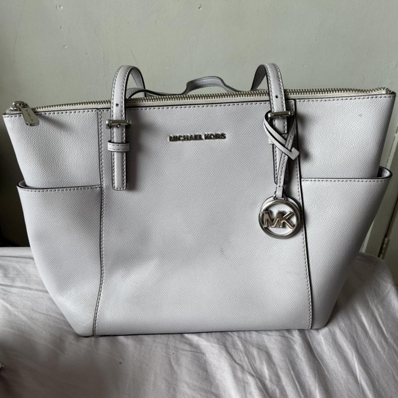 Authentic Michael Kors bag Been used but still in... - Depop