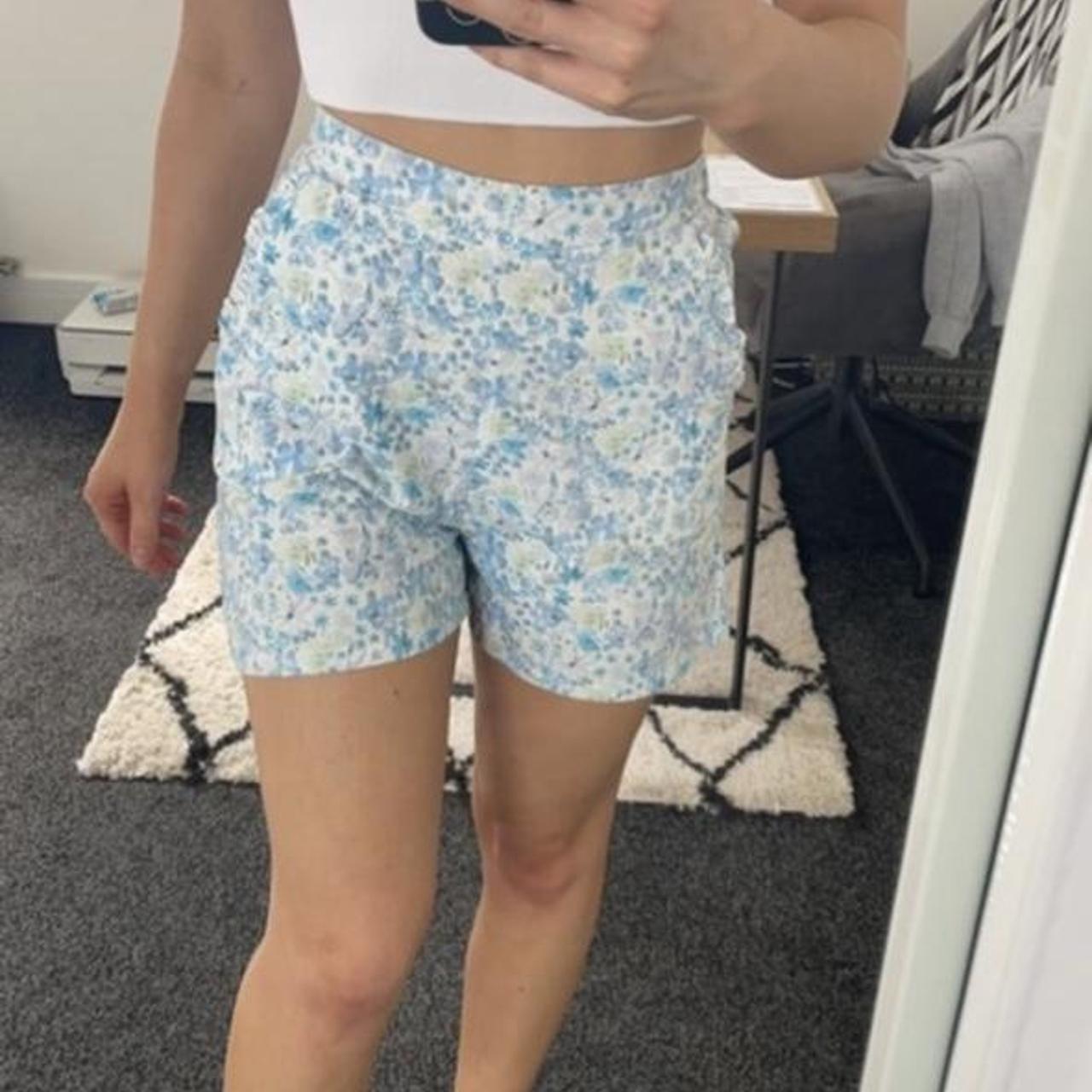 Primark blue flowery shorts size 4 but also would... Depop