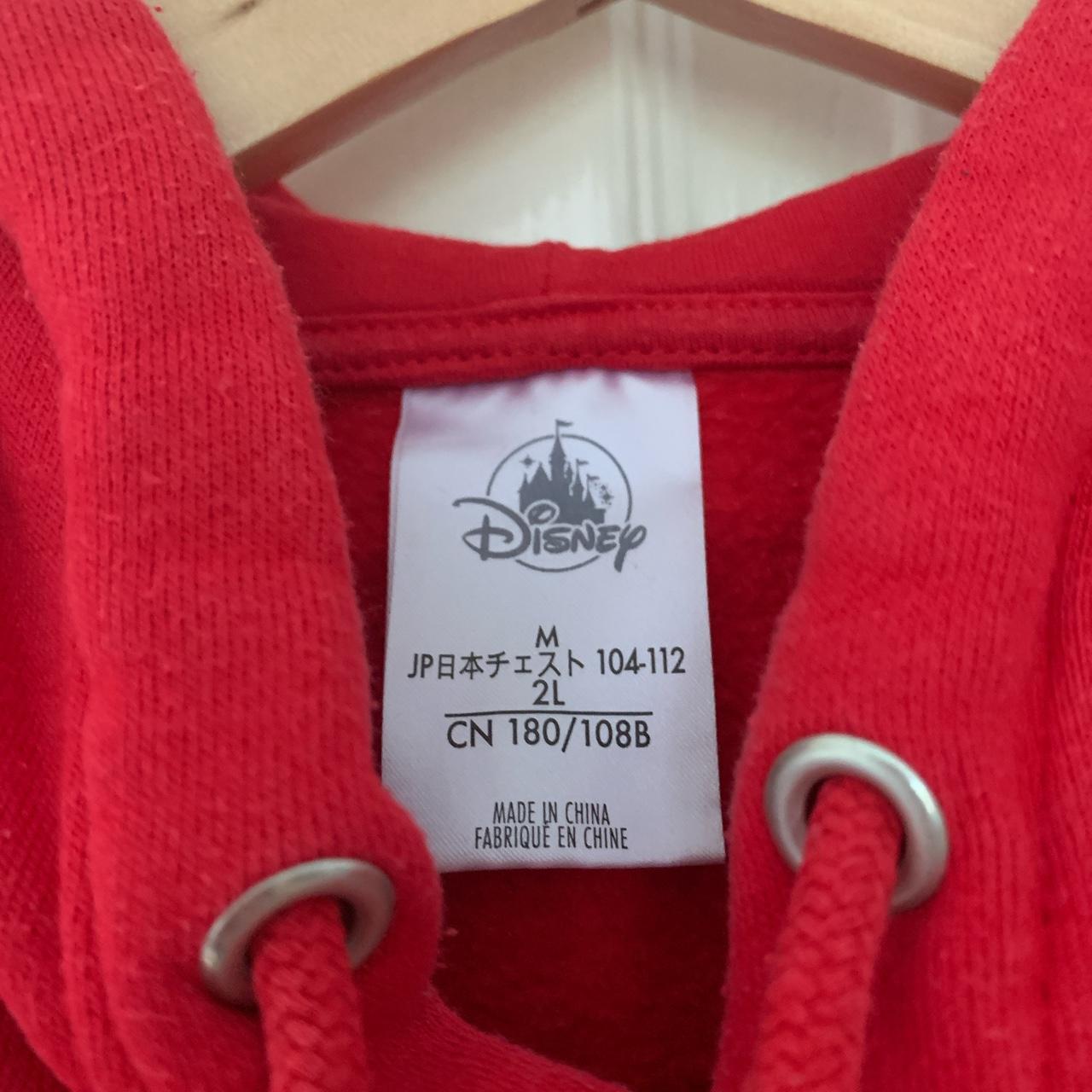 Disneyland red hoodie with detail stitching.... - Depop