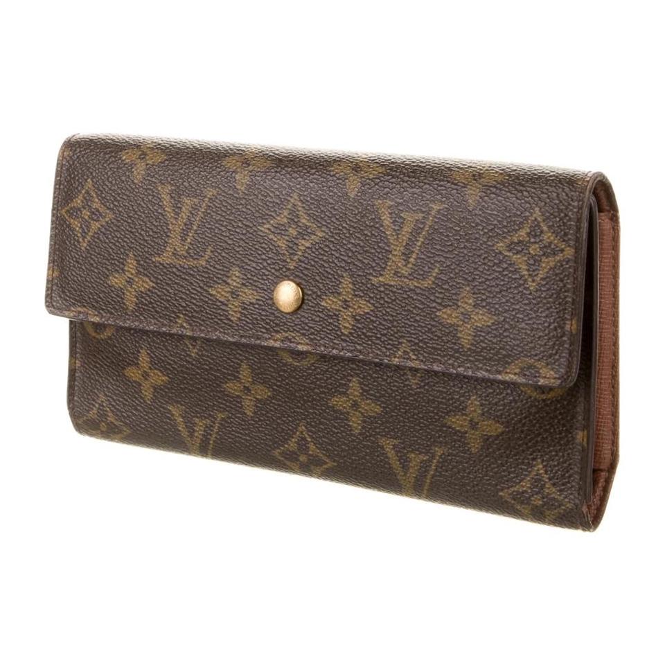 Louis Vuitton Blue Monogram Vernis Sarah Wallet - Depop