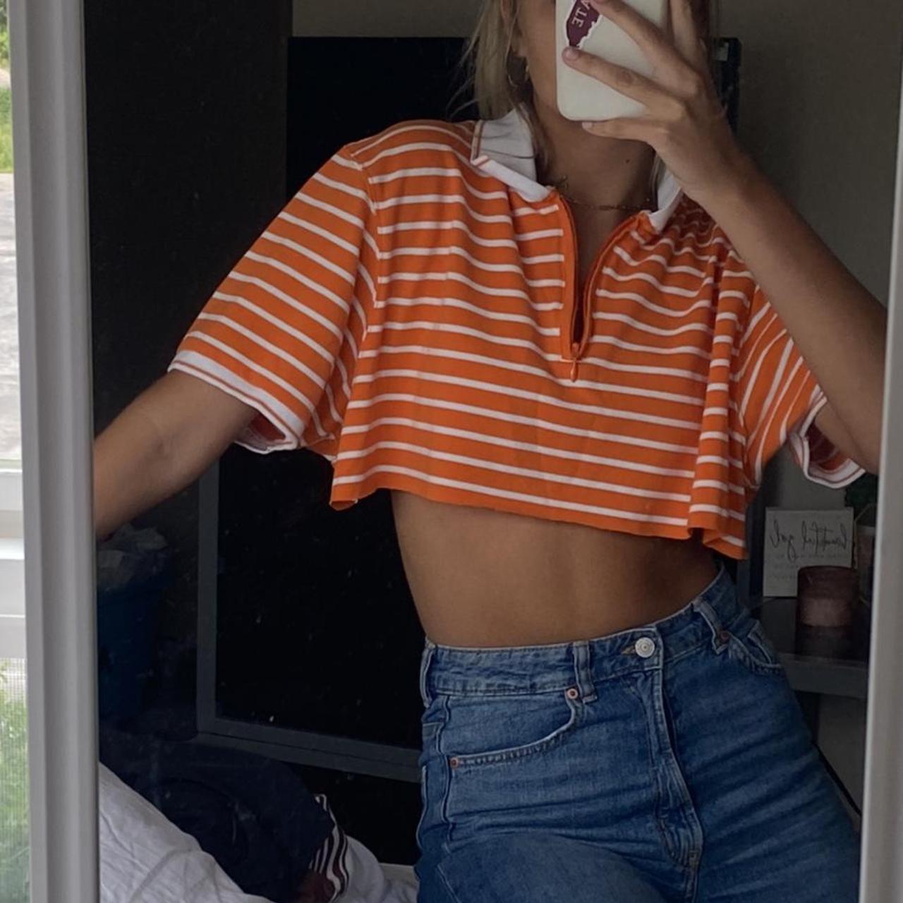 Emma Chamberlain: Green Tee, Striped Pants