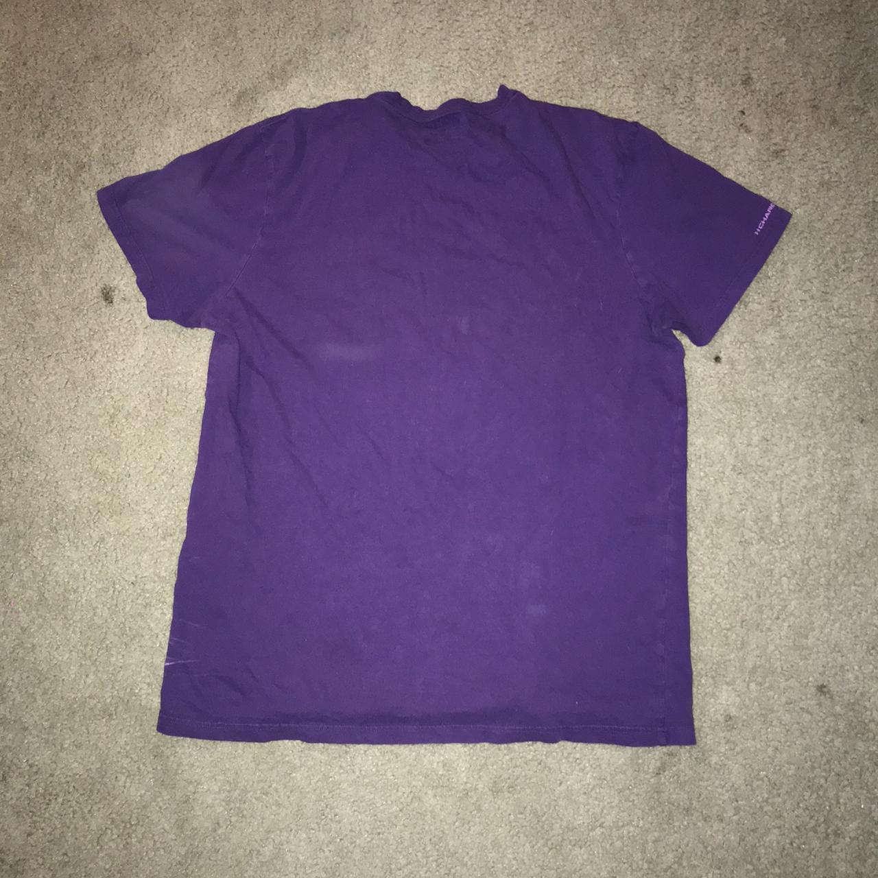 Dark purple Under Armour shirt The logo is peeling... - Depop