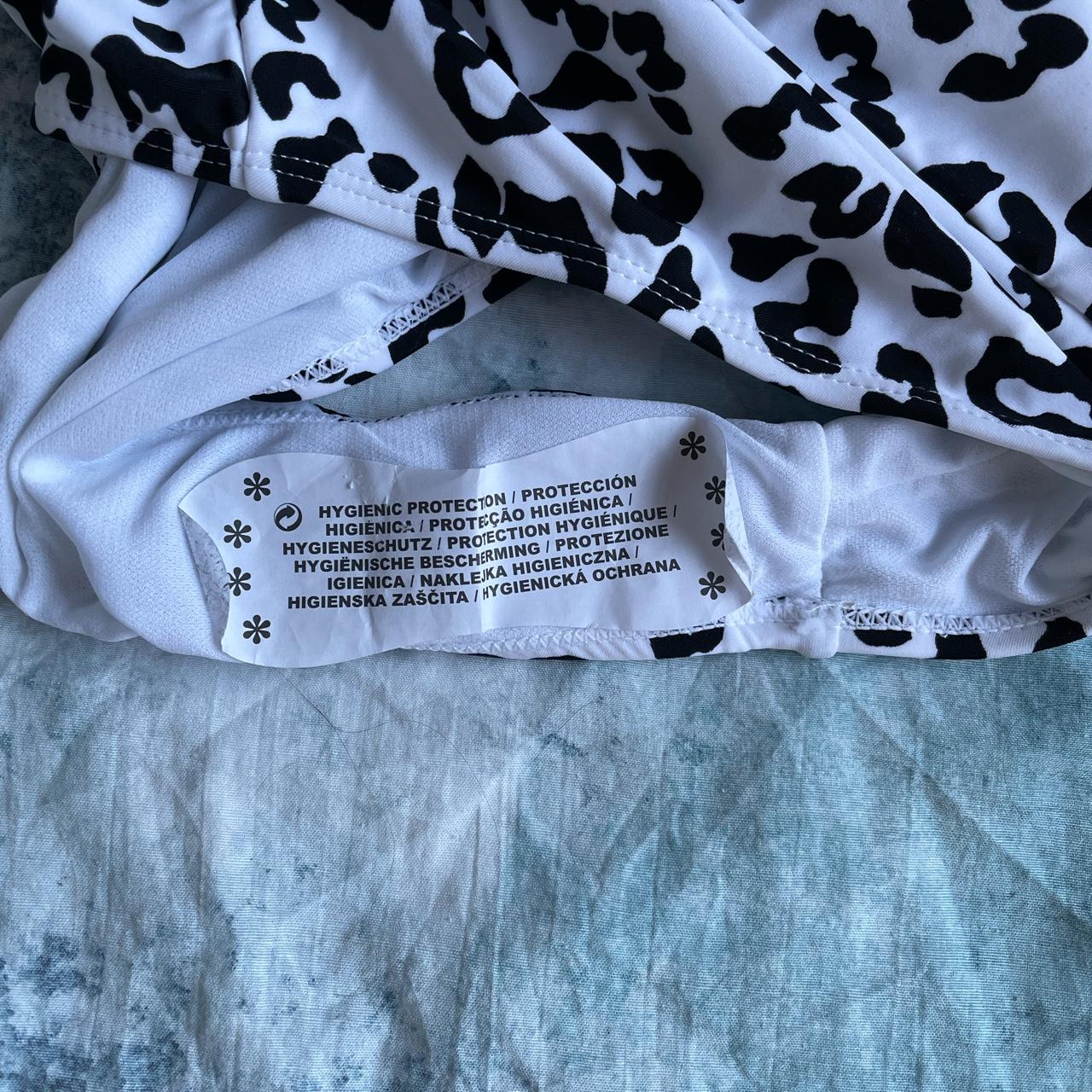 white-leopard-print-swimming-costume-with-low-cut-depop