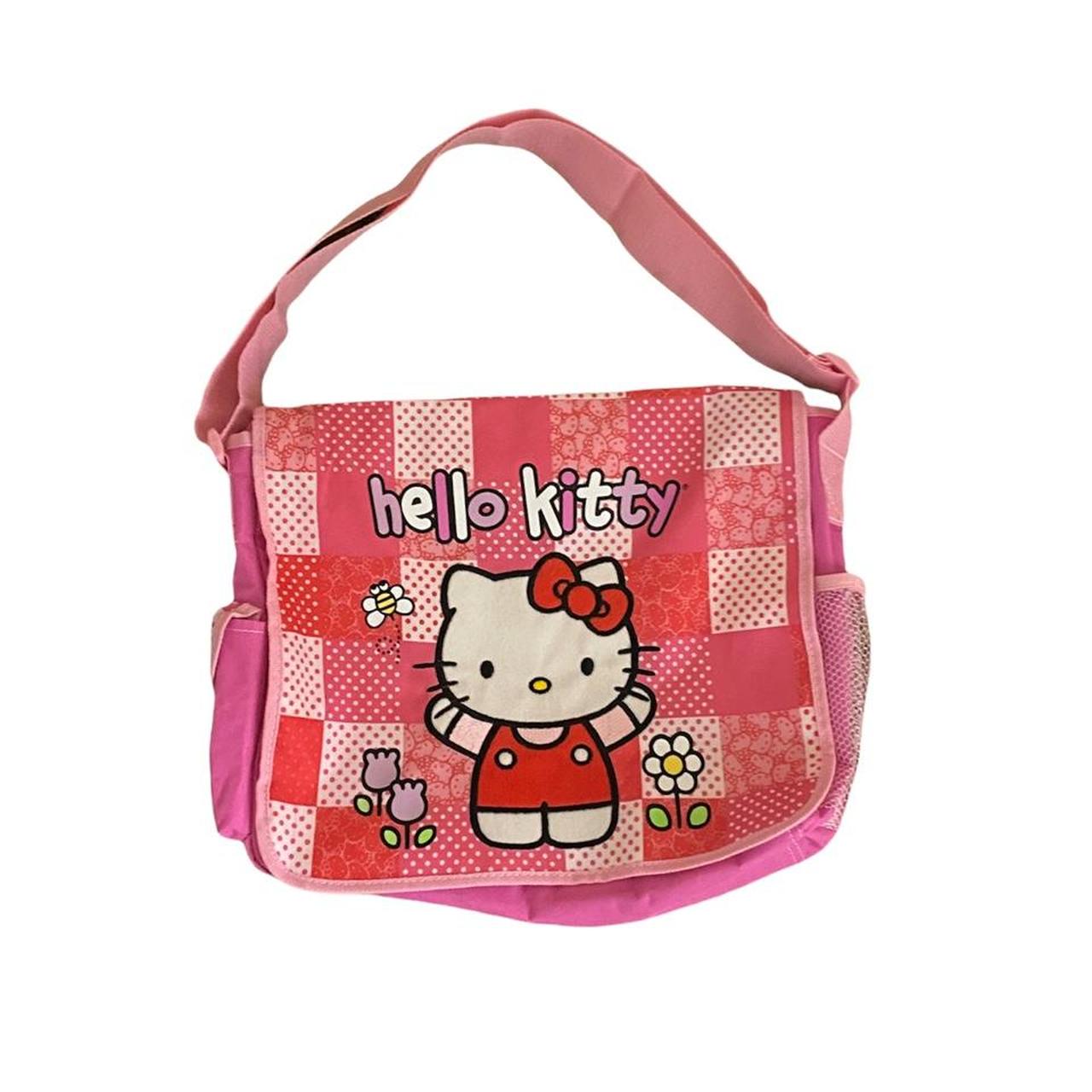 Hello kitty messenger bag, never worn, has lots of... - Depop