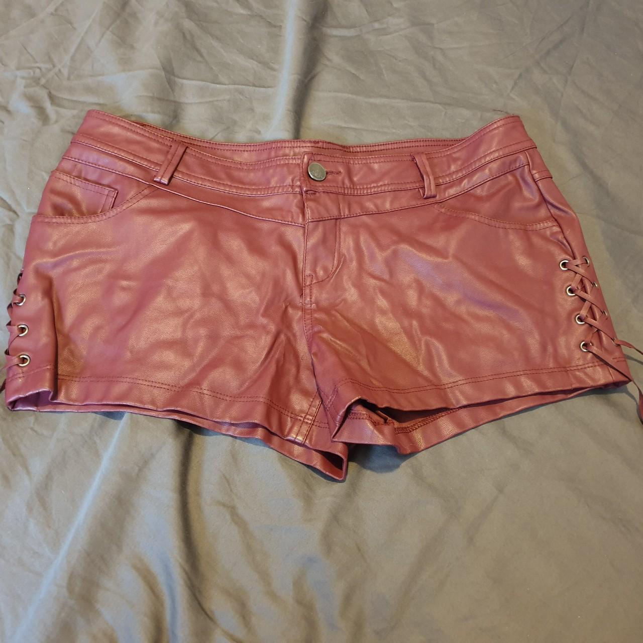 Red leather shorts with lace up detail on the side,... Depop