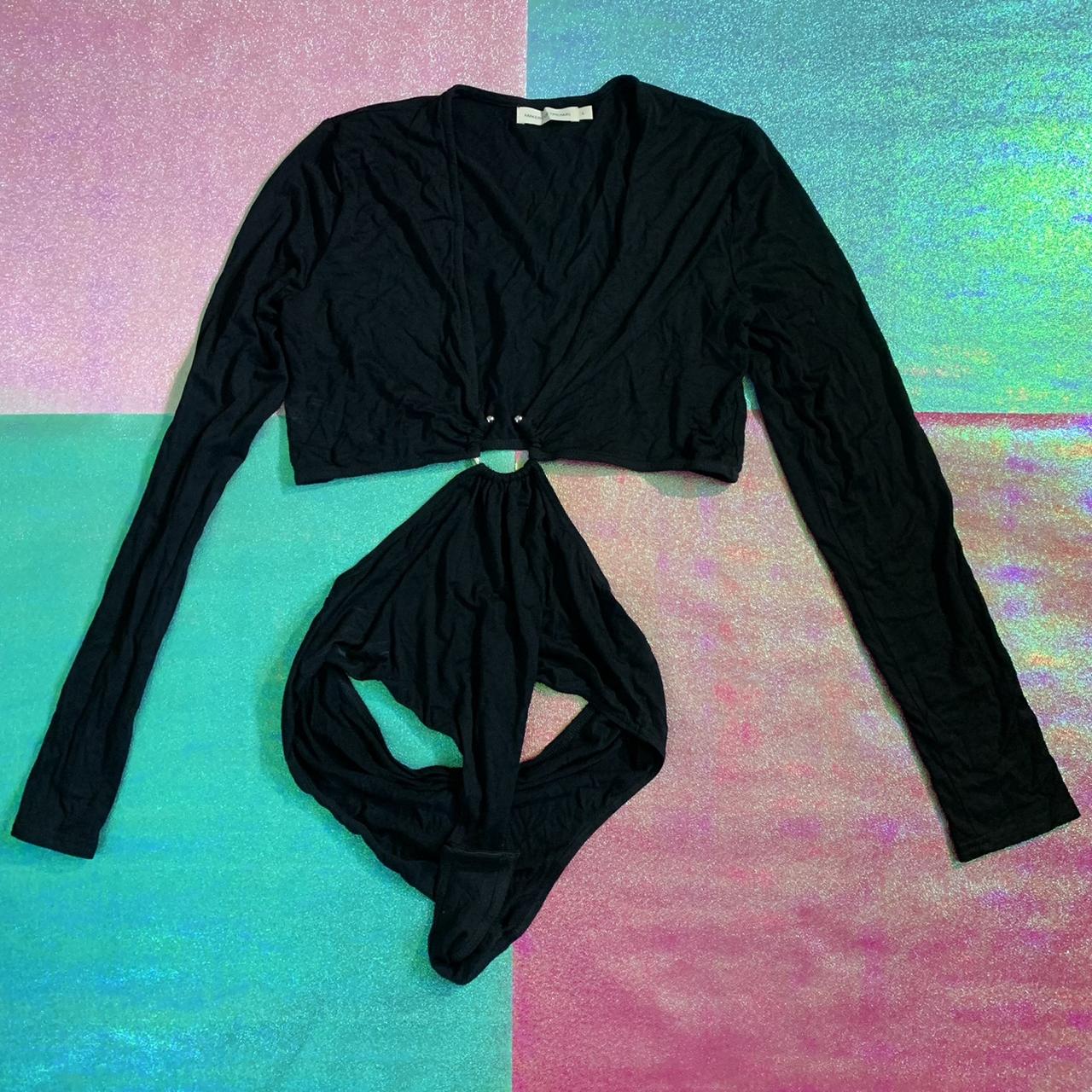 This bodysuit is from Dolls Kill. It has an Oring... Depop