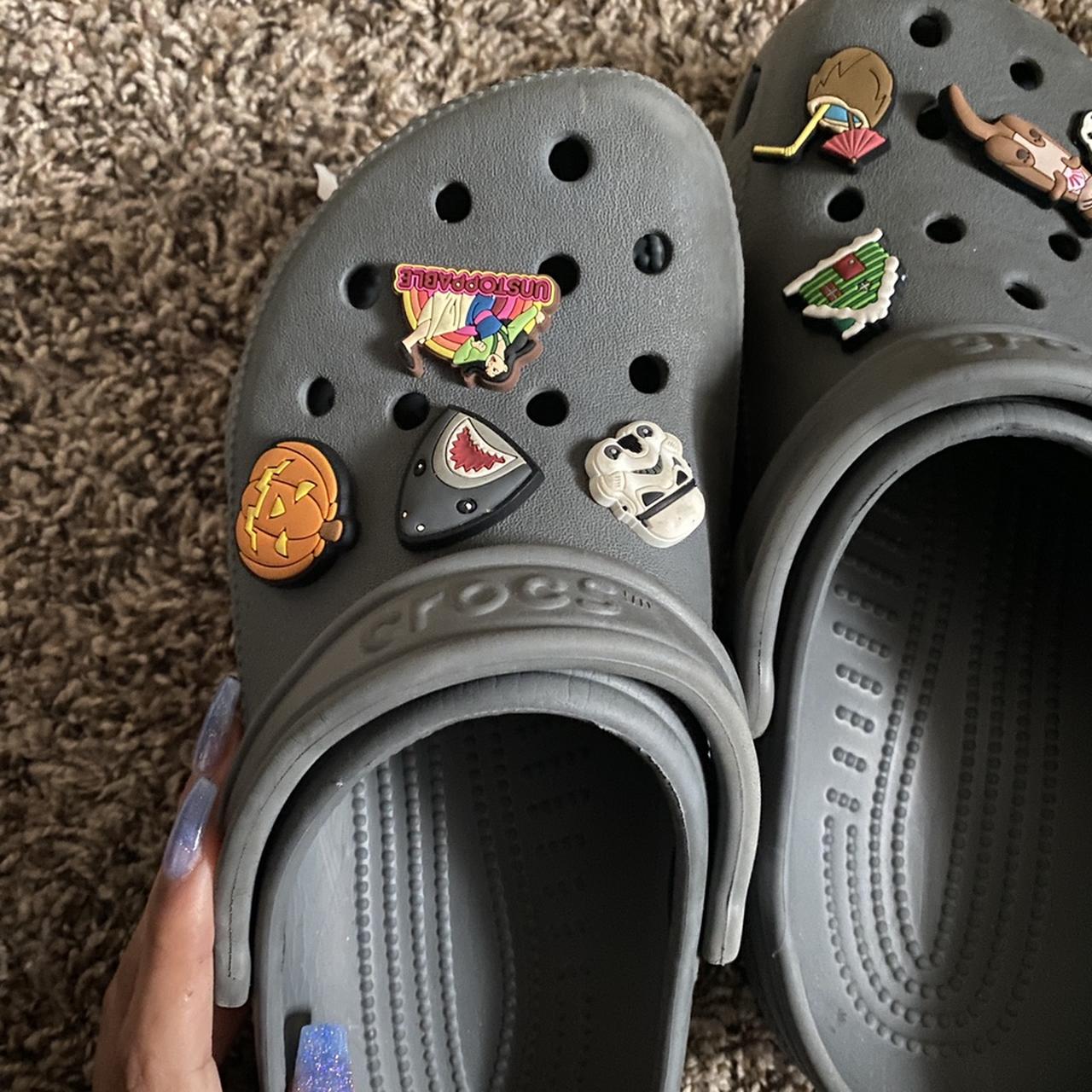 grey crocs with charms