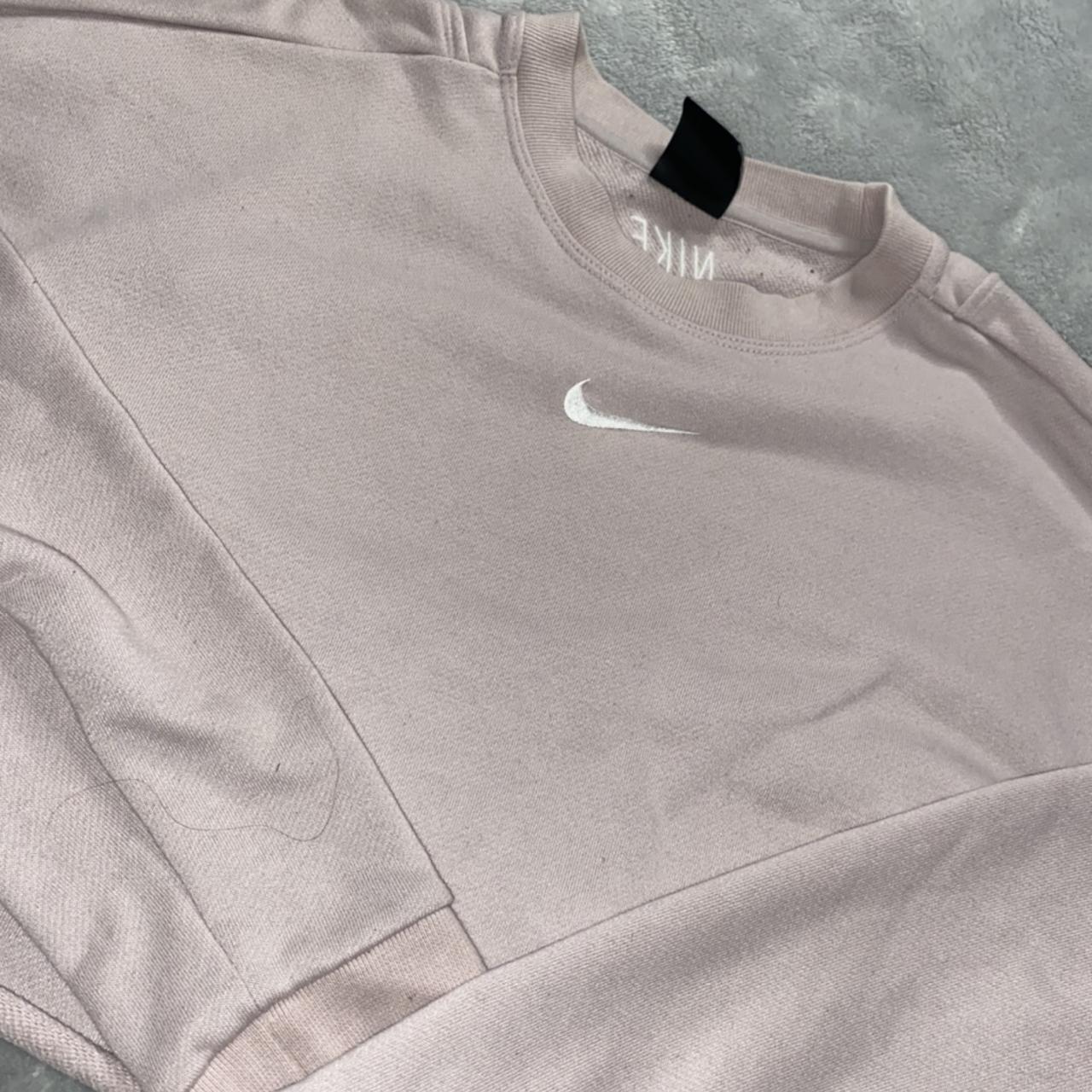 Used cropped light pink Nike sweatshirt with cut out... - Depop