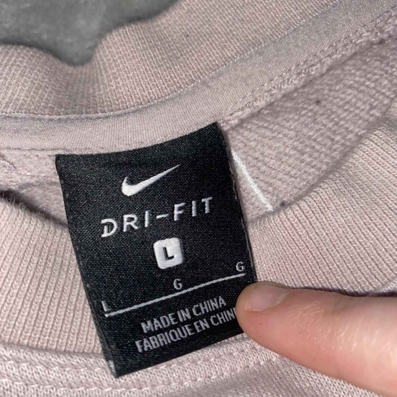 Used cropped light pink Nike sweatshirt with cut out... Depop