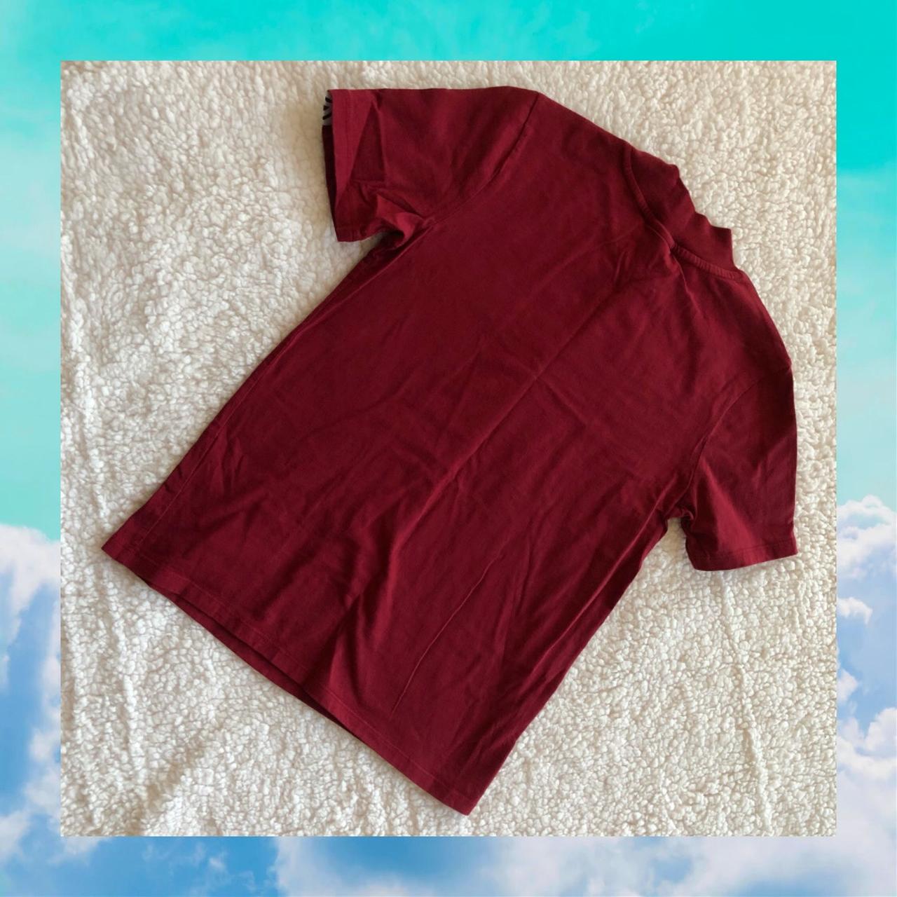 Umbro Women's Burgundy T-shirt | Depop