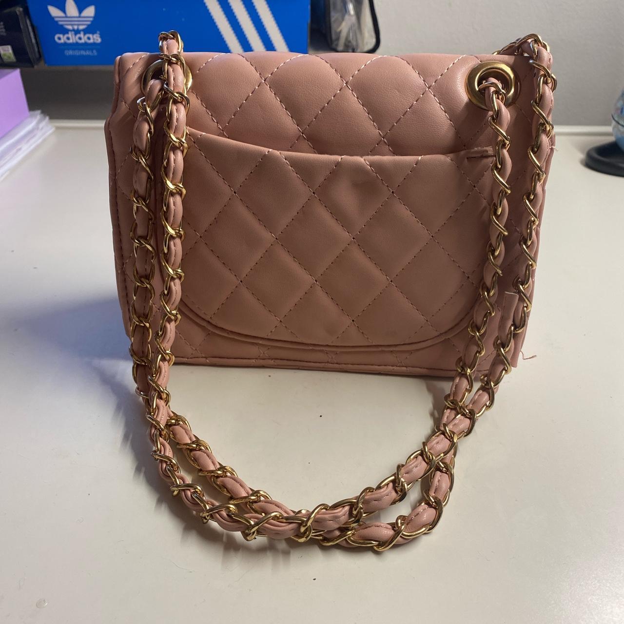 Small pink shoulderbag with gold detailing Open... - Depop