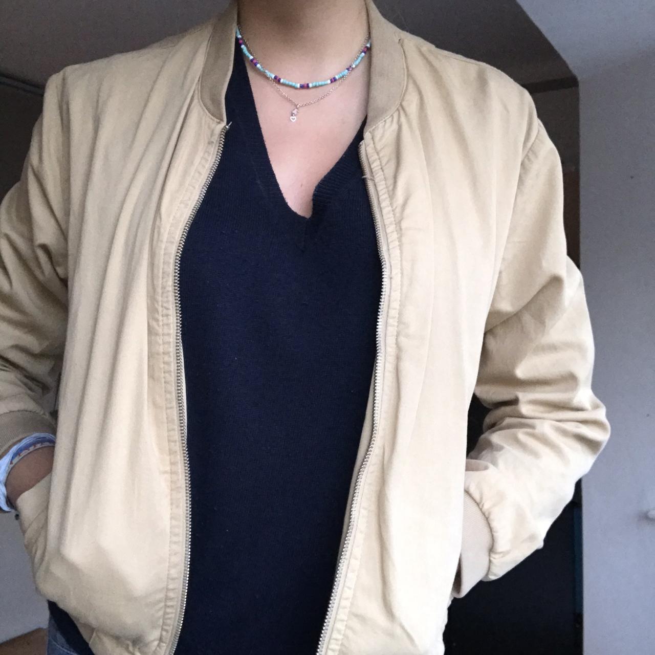 Tan coloured bomber jacket from Italian