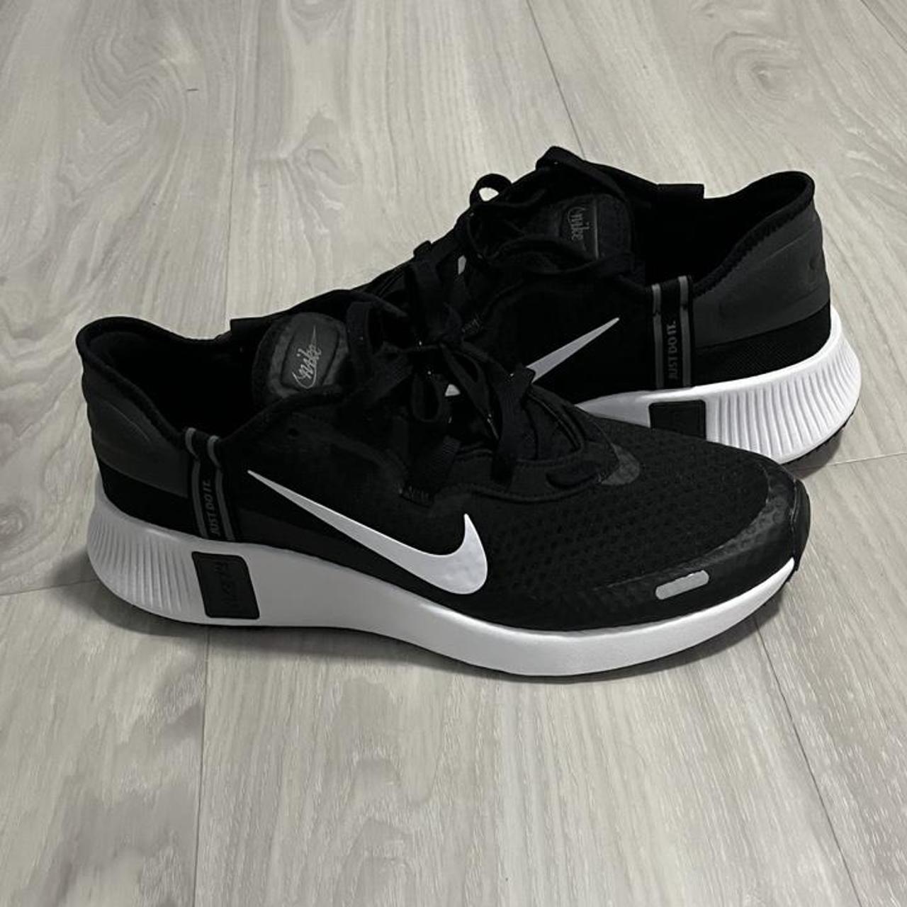 nike reposto men's black