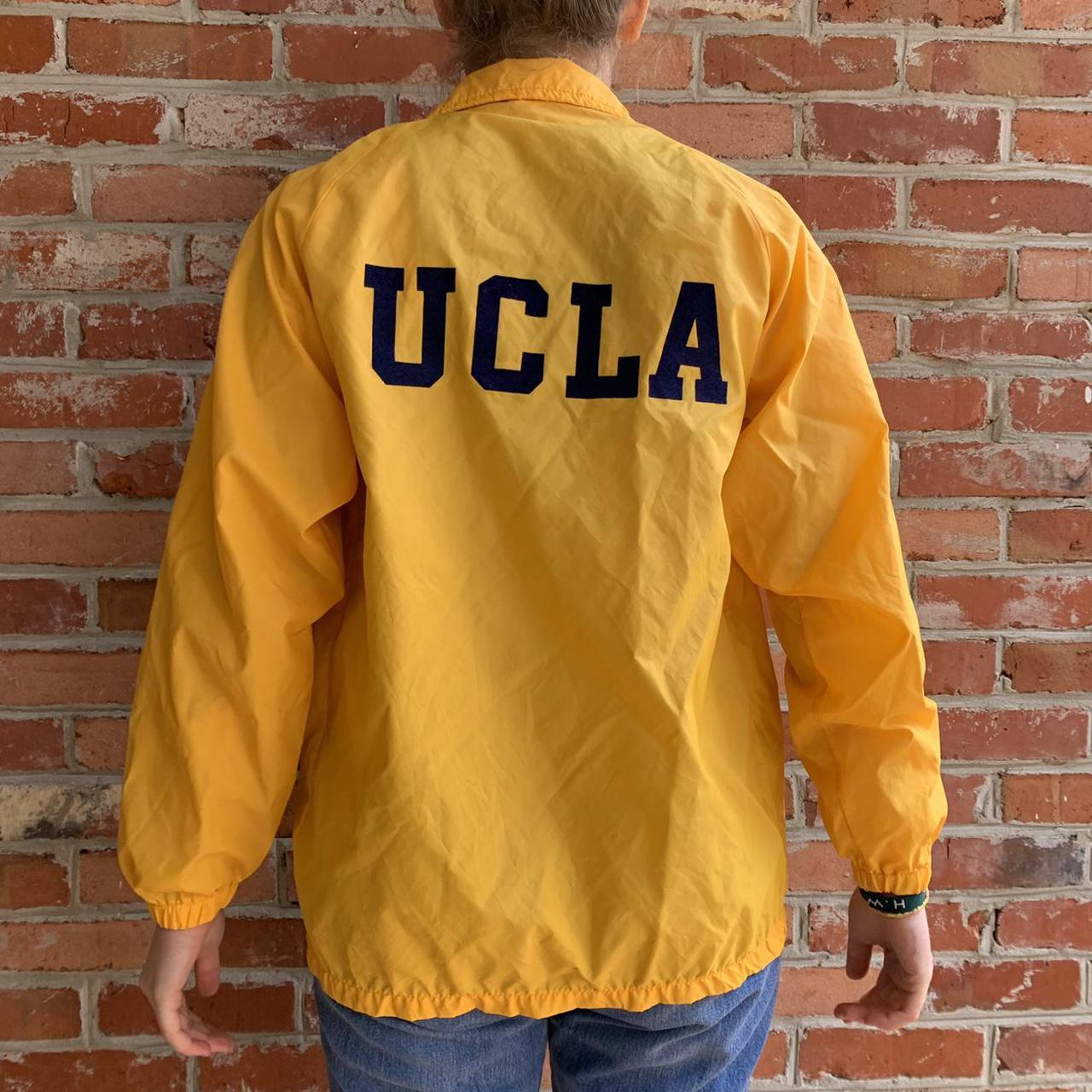 VINTAGE UCLA yellow windbreaker snap button up... - Depop