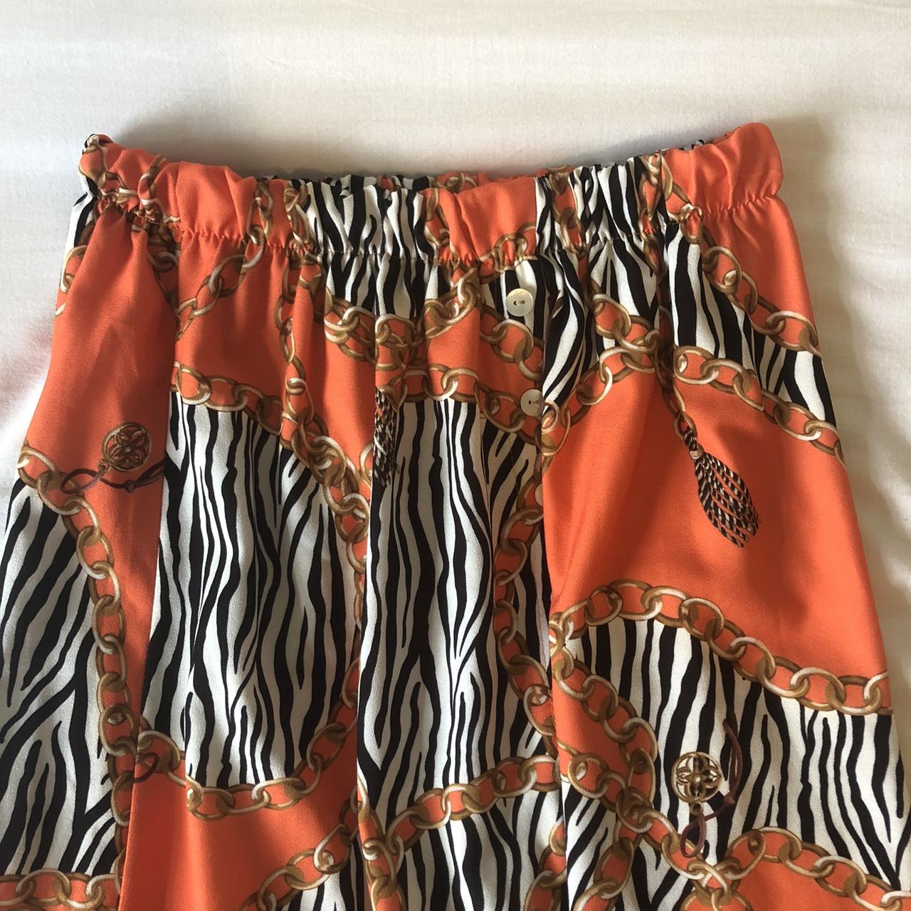 orange maxi skirt with zebra print 🧡, has a high