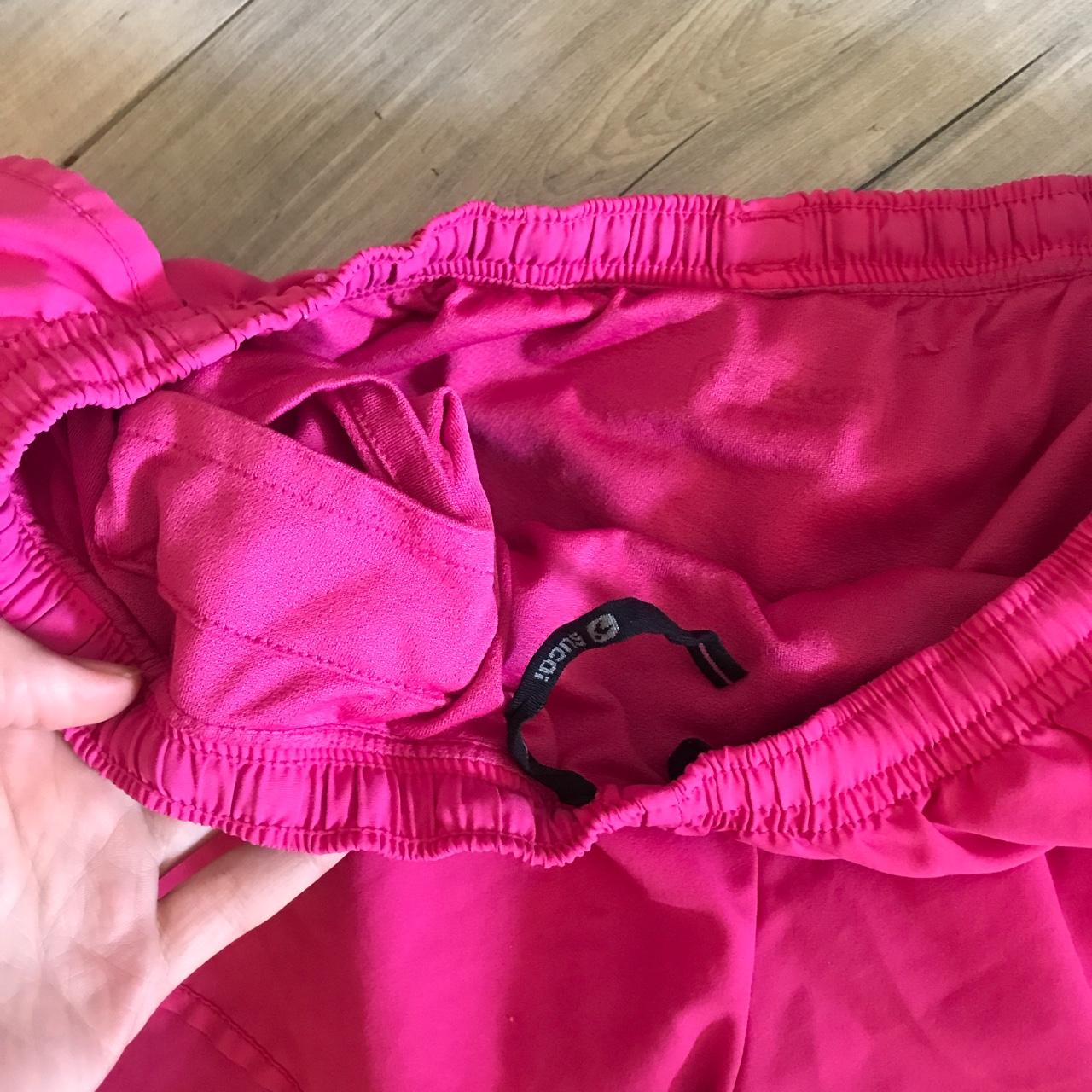 Sugoi split running shorts pink size... - Depop