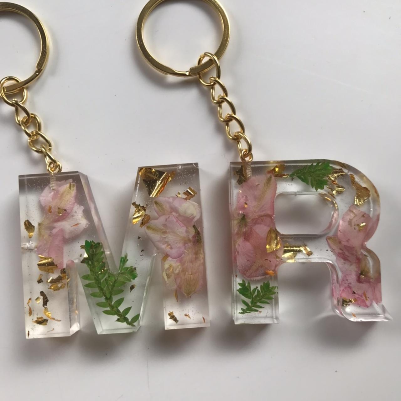 Resin keychains with pink flowers, green leaf