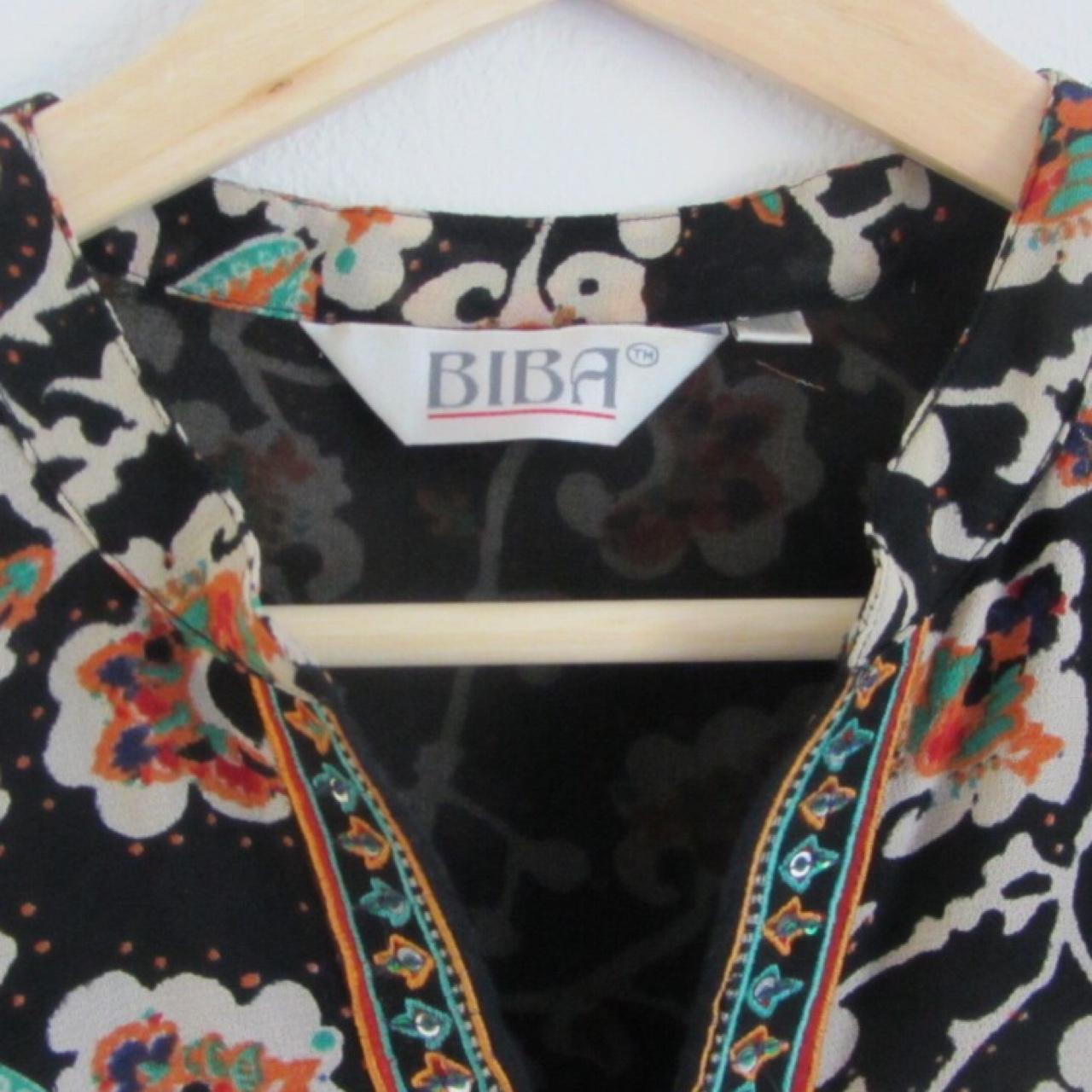 Biba tunic made with sheer material. Fits like a... Depop