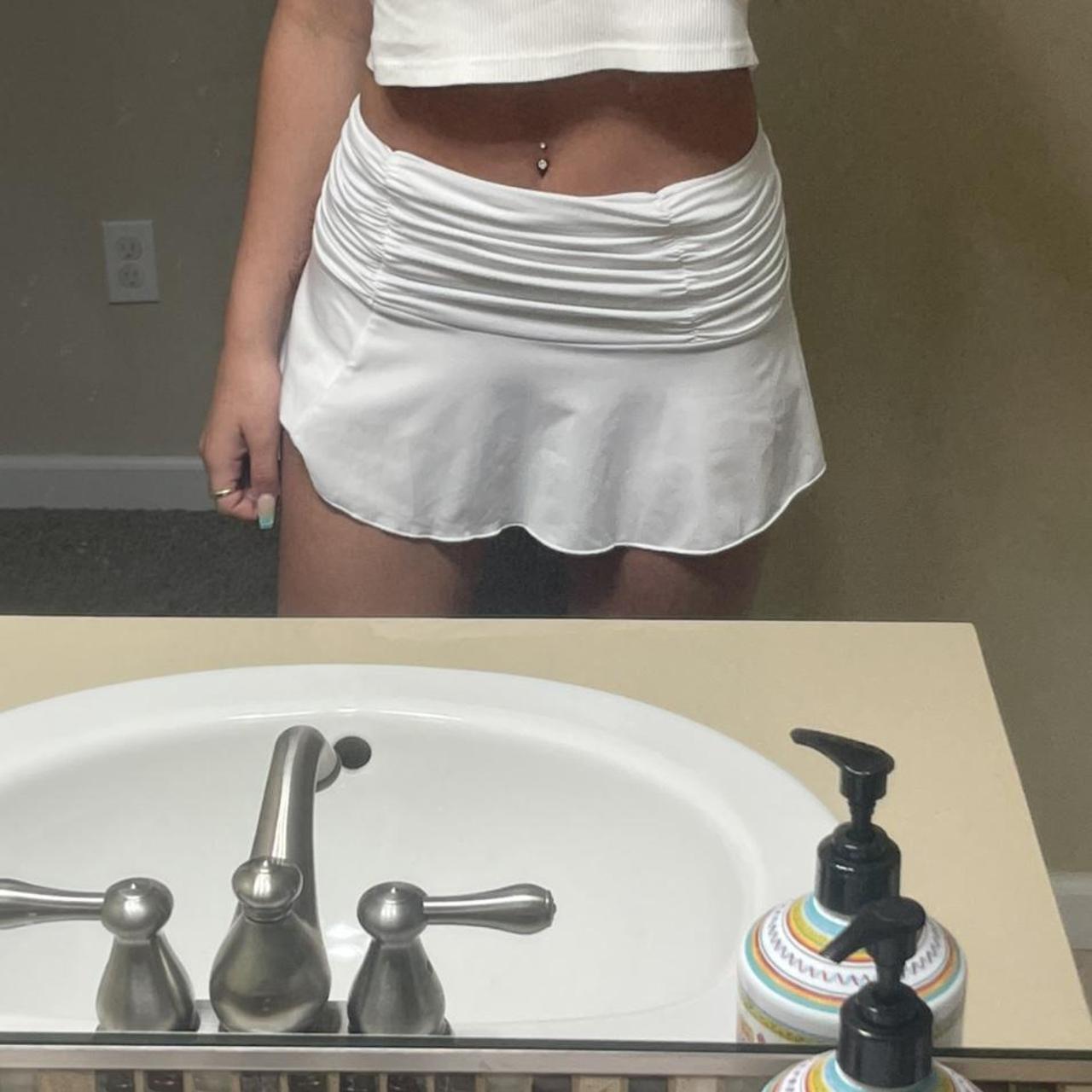 White flow mini skirt only worn 1 time. No stains or... - Depop