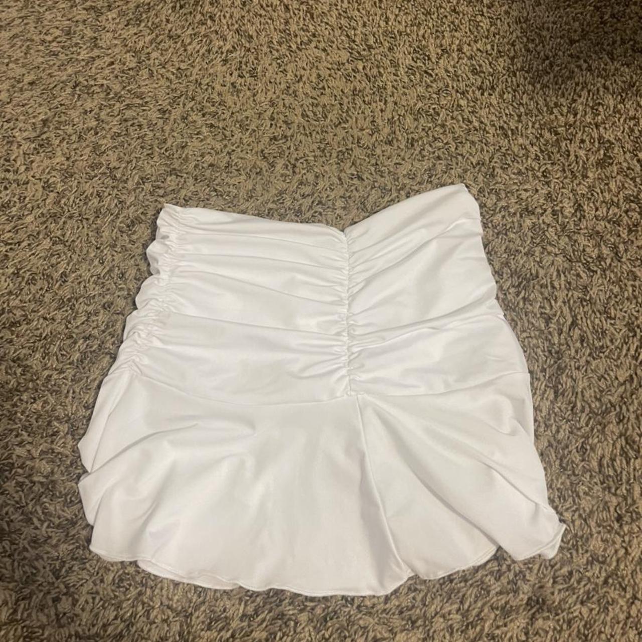 White flow mini skirt only worn 1 time. No stains or... - Depop