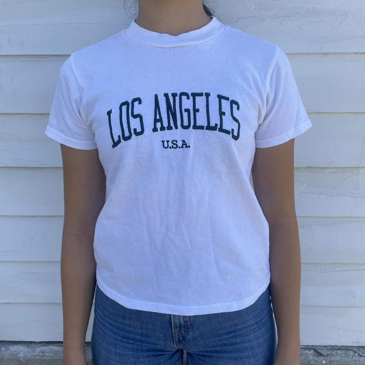 White brandy Melville t-shirt with green “Los... - Depop