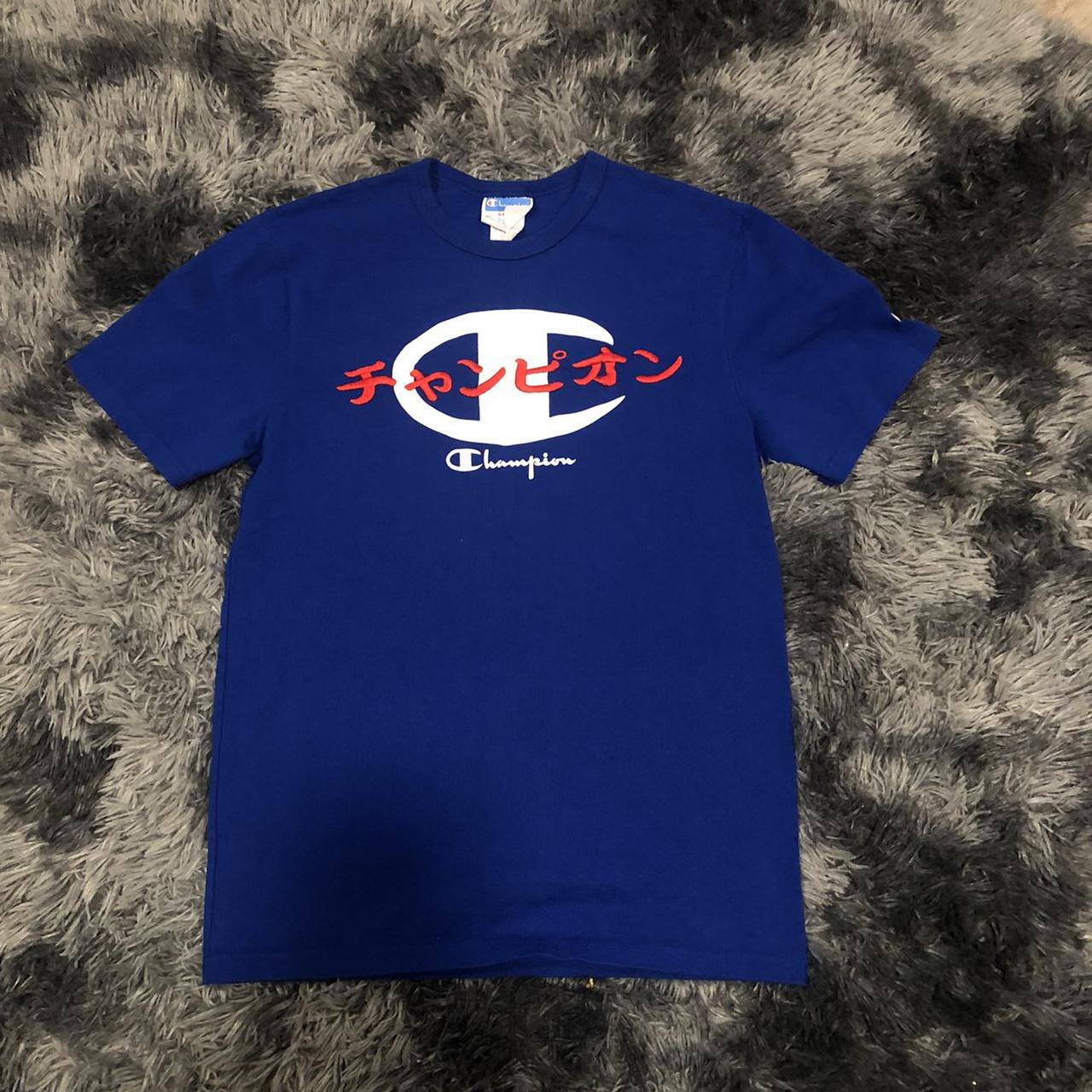 Red white and 2024 blue champion shirt