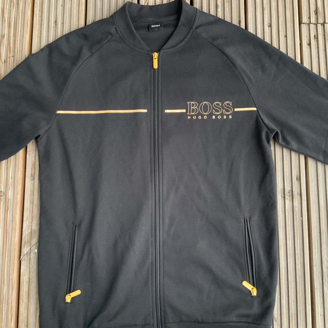 black and gold boss jacket