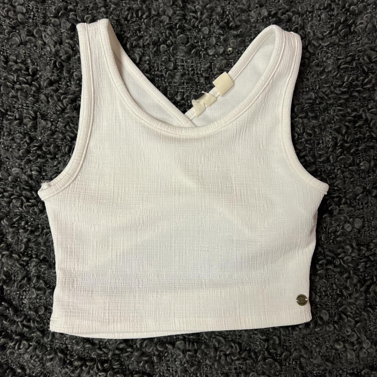 roxy tank top with a criss cross back, purchased in... - Depop