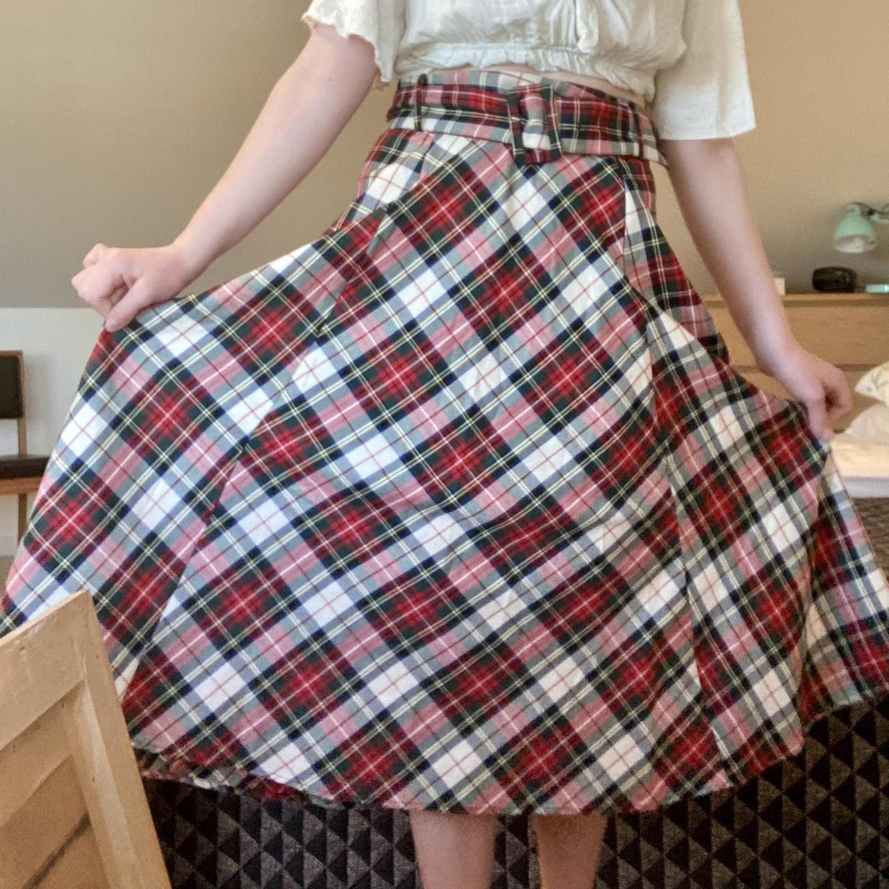 H&M midi tartan skirt with matching belt. zips up at... Depop