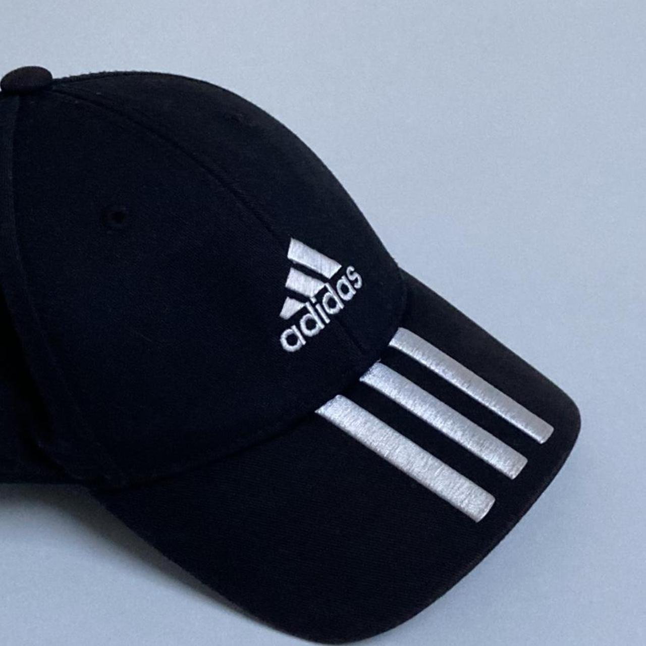 harga cap adidas