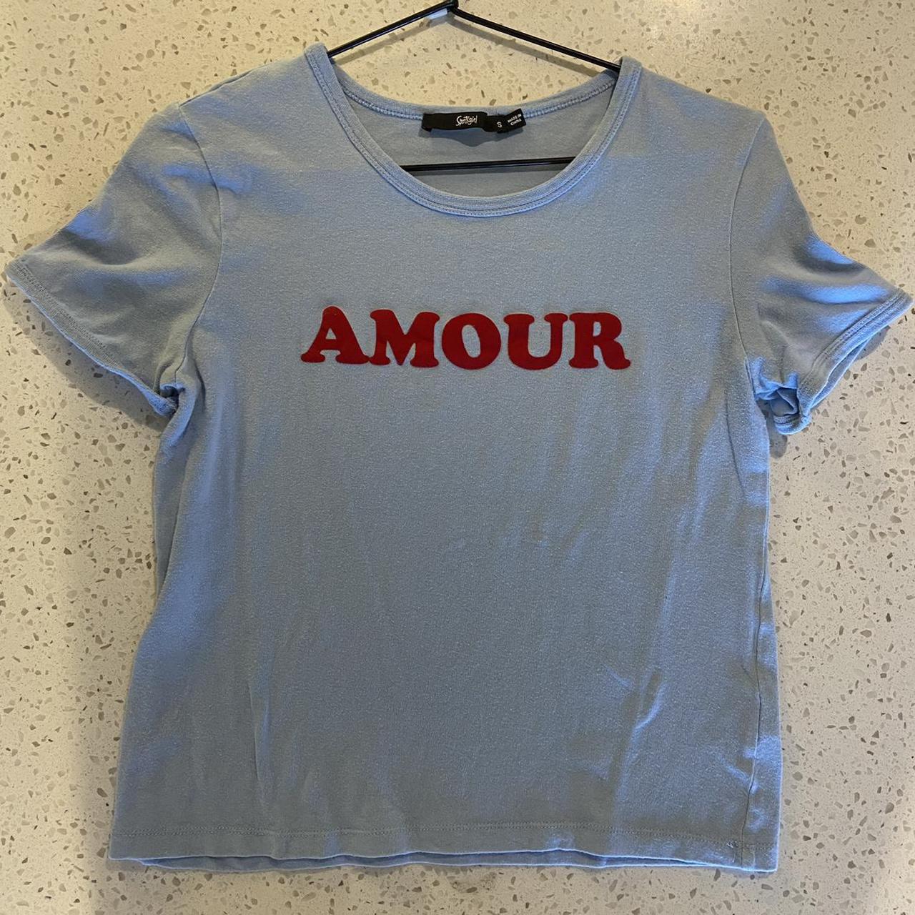 Baby blue sportsgirl tshirt 💙 ️ red writing is in a... Depop