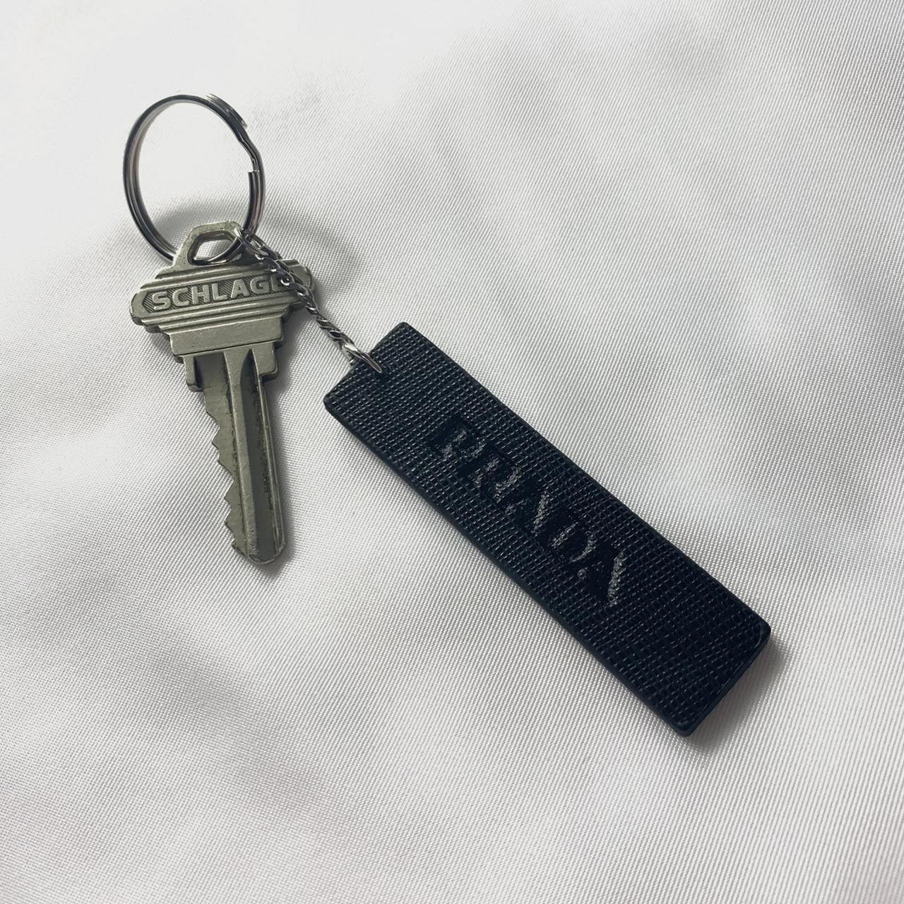 AUTHENTIC PRADA KEY HOLDER - discoloration pictured - Depop