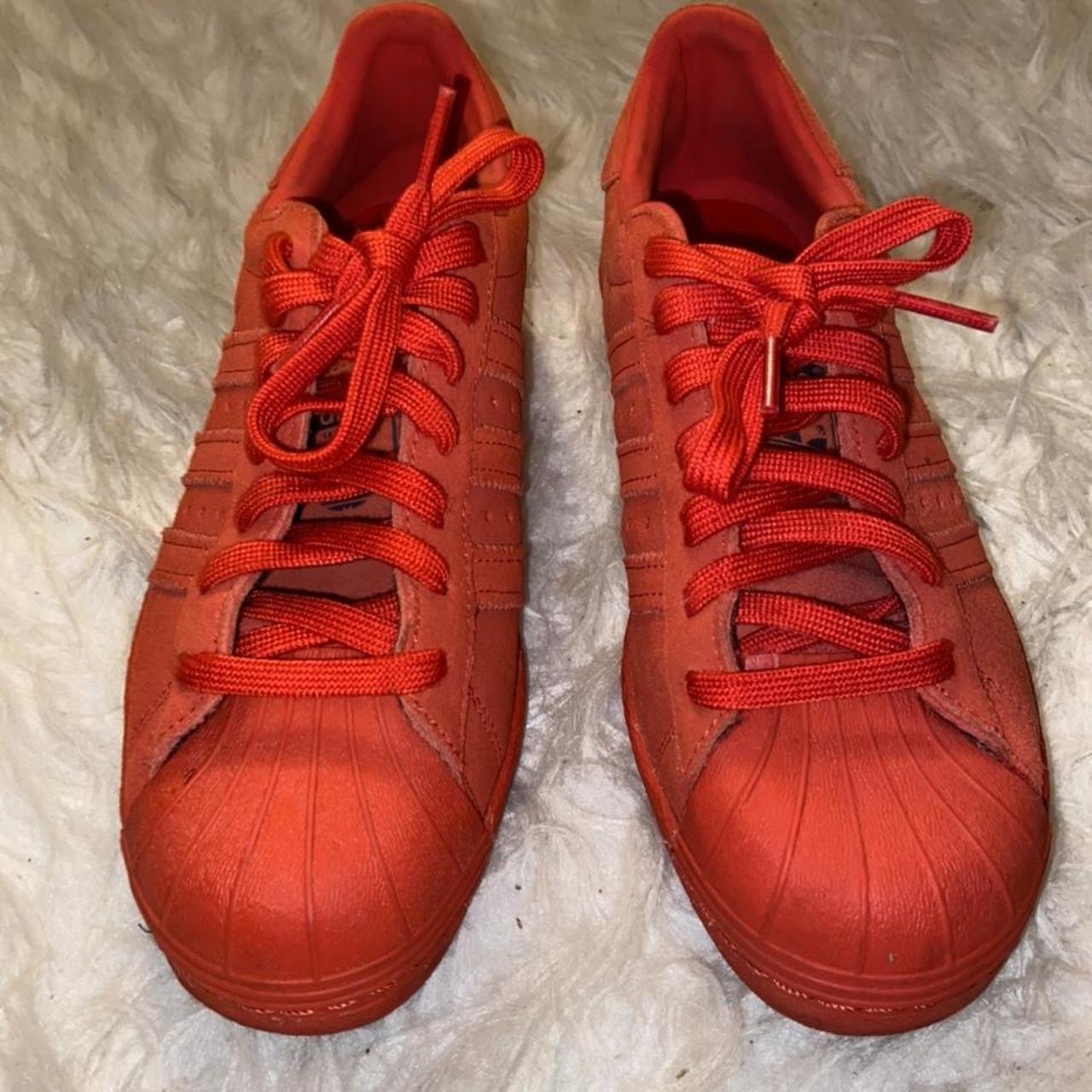 All red high store top shell toe adidas