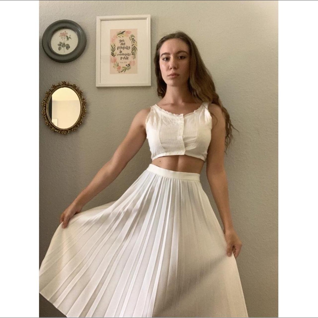 Long & flowy white pleated skirt. Has a very 1950s... Depop