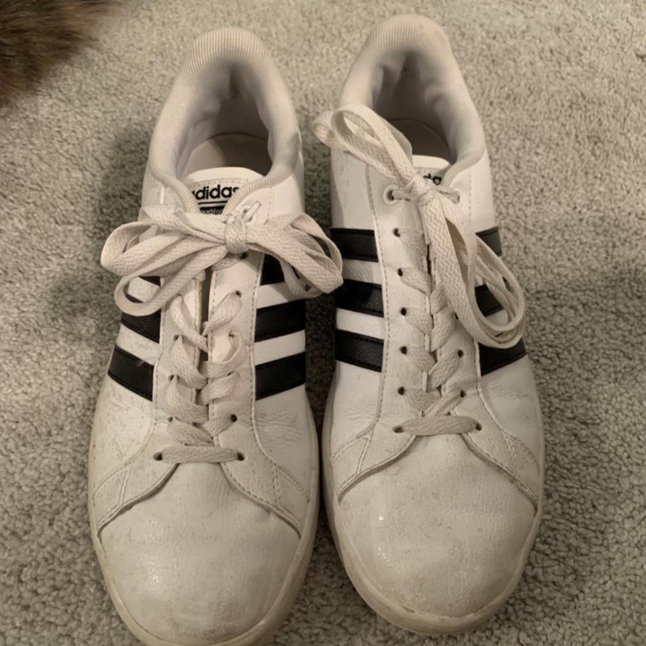 White adidas sneakers with black stripes - good... - Depop