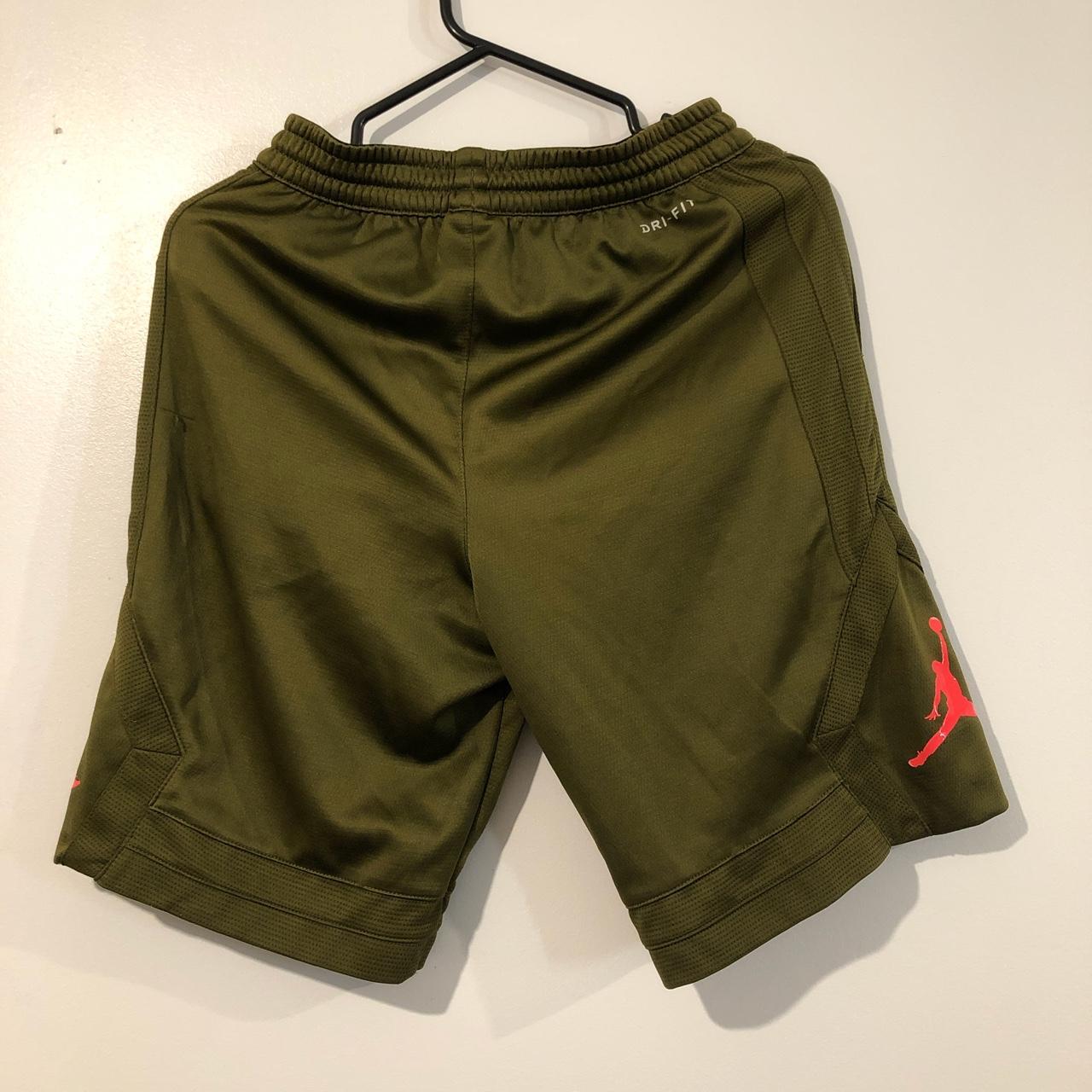 Nike Jordan green shorts they say 1213 however fit... Depop
