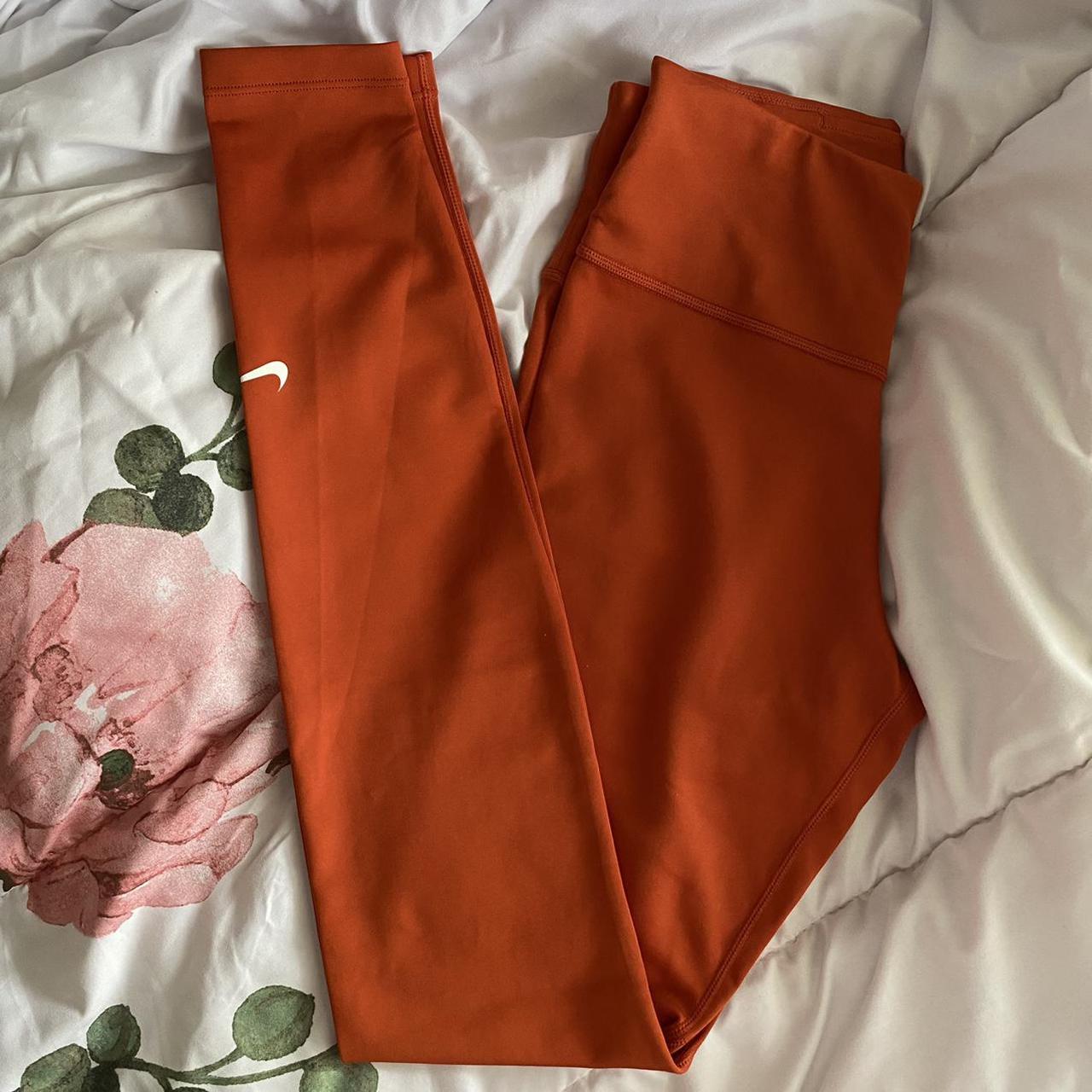 orange leggings nike