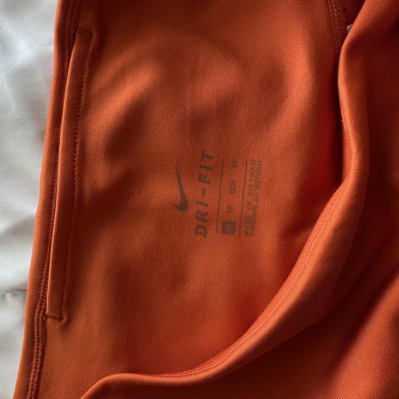 orange leggings nike