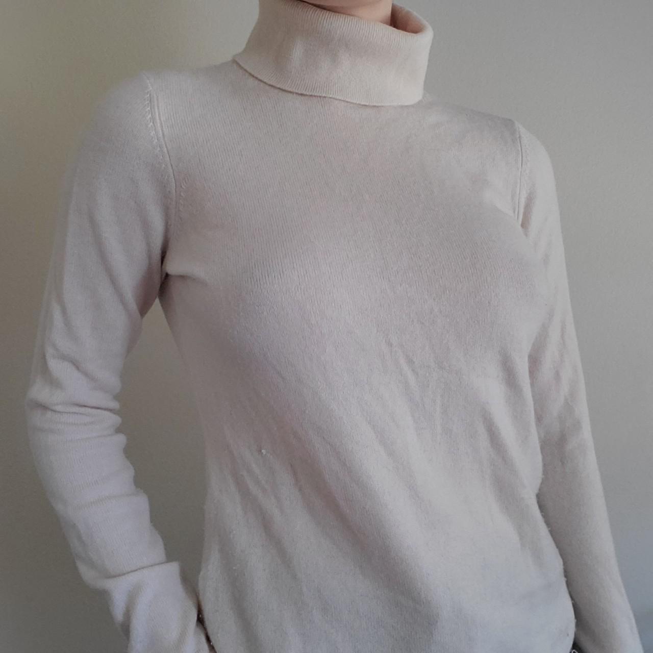 cream turtleneck shirt