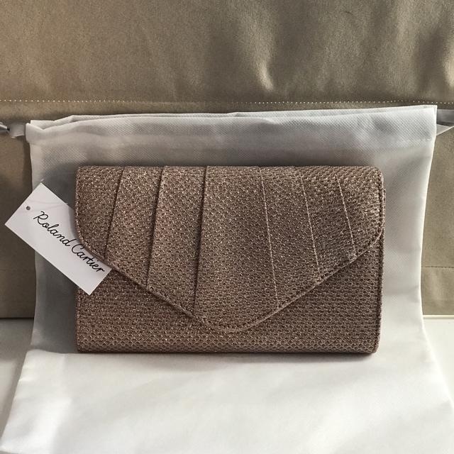 Roland cartier sale clutch bags